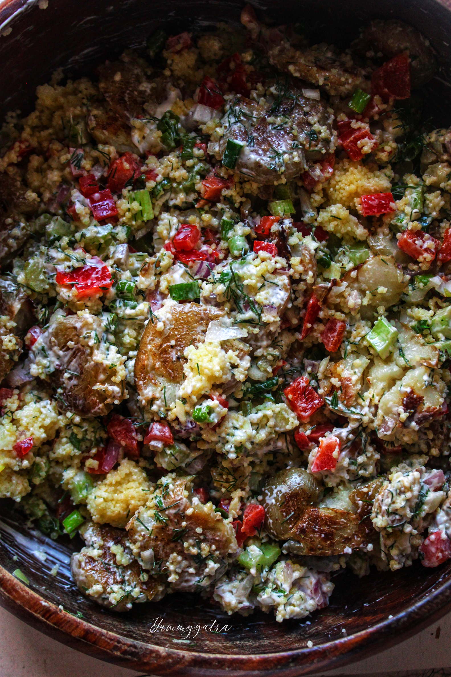 Smashed potato salad with herbs and couscous 