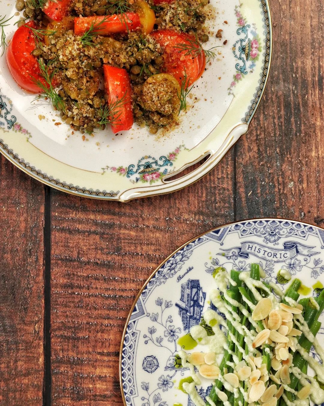 Tomato and lentil salad with dill and pangrattato 🍅 Vs green bean salad with ajo blanco 🧄 order one (or both) alongside other delicious small plates at our June pop-up at @thesqueezecafe - bookings open now at the link on bio 🧡