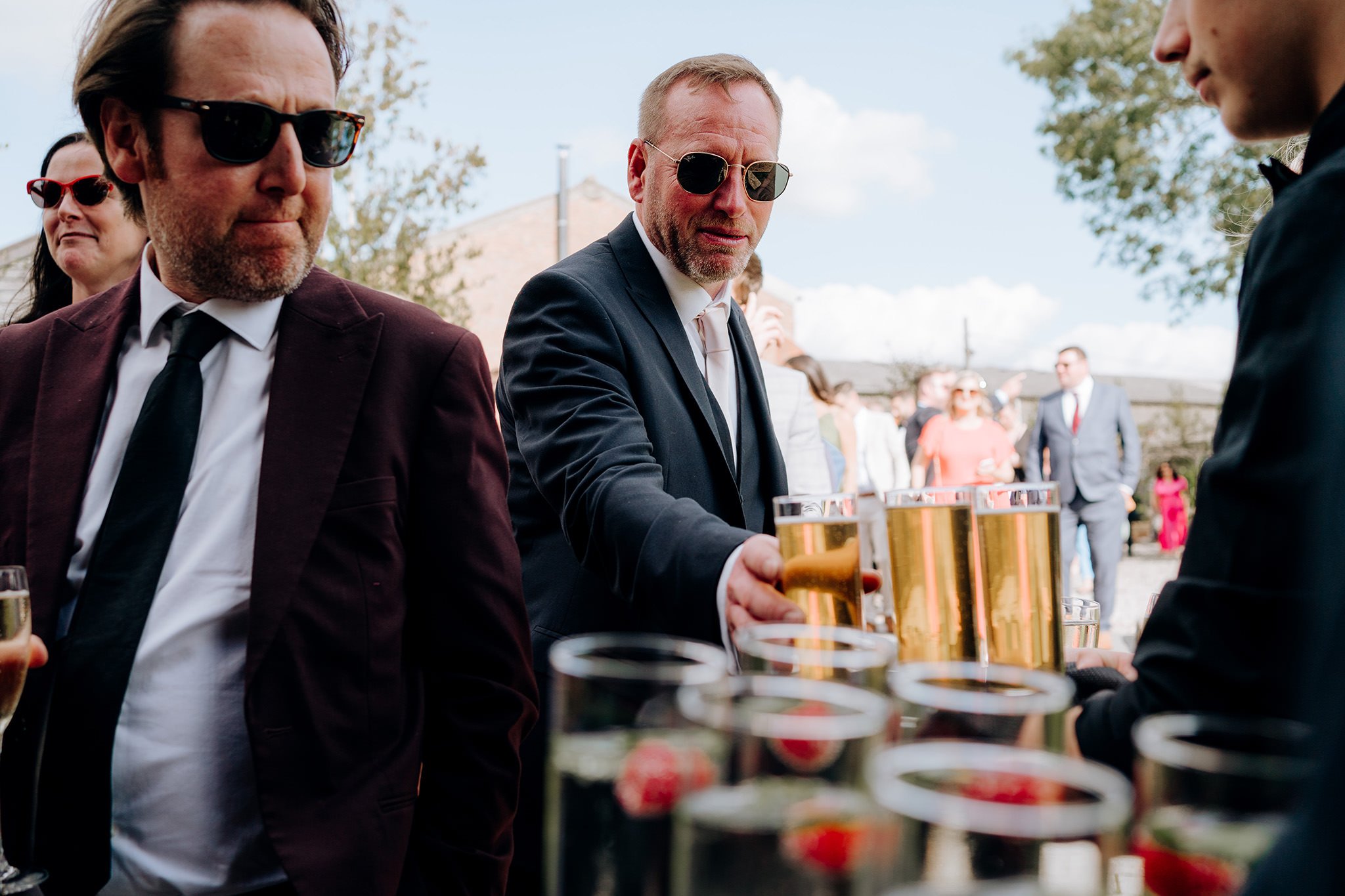 Wedding guest taking a drink