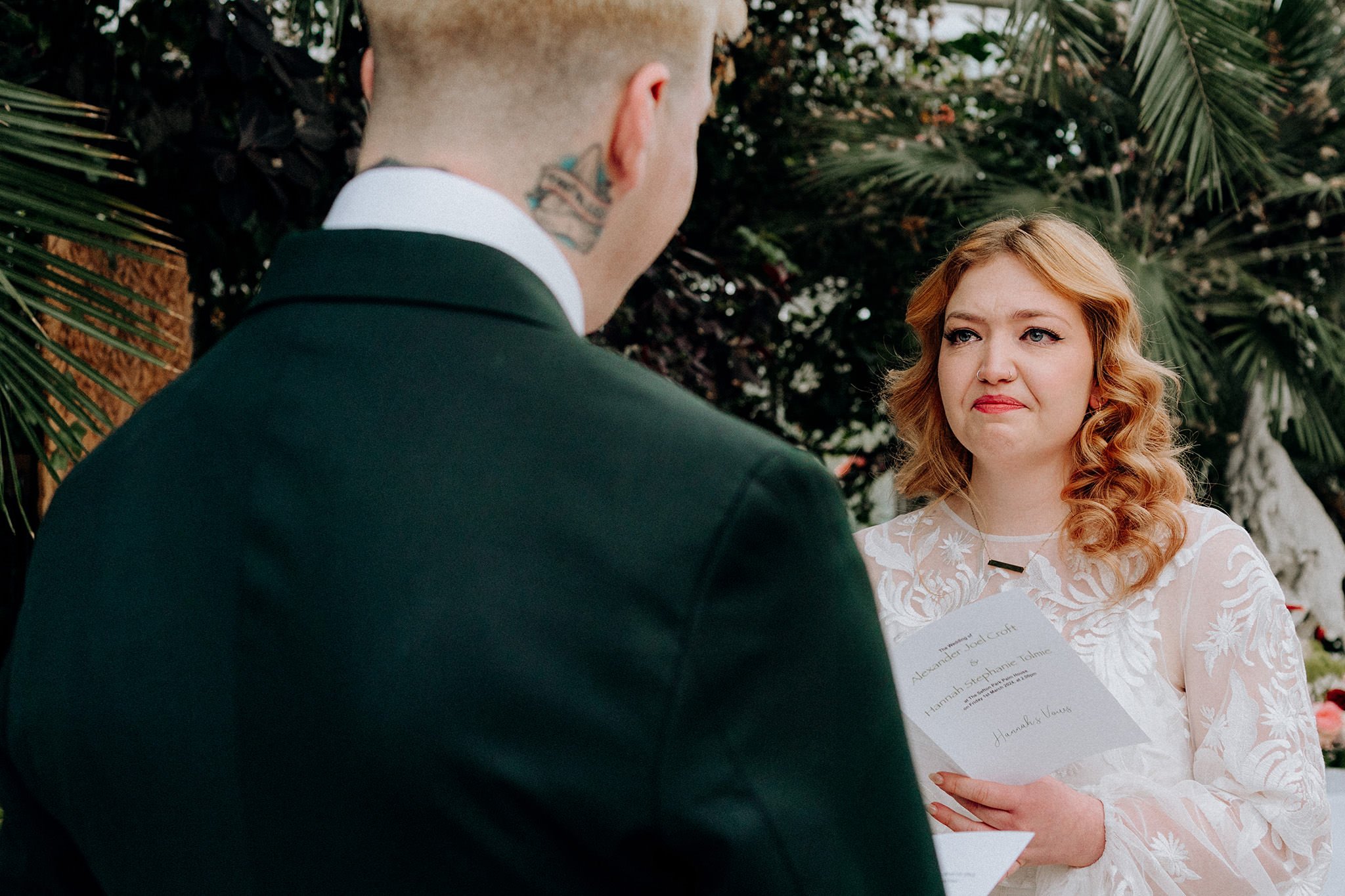 Emotional bride exchanging vows