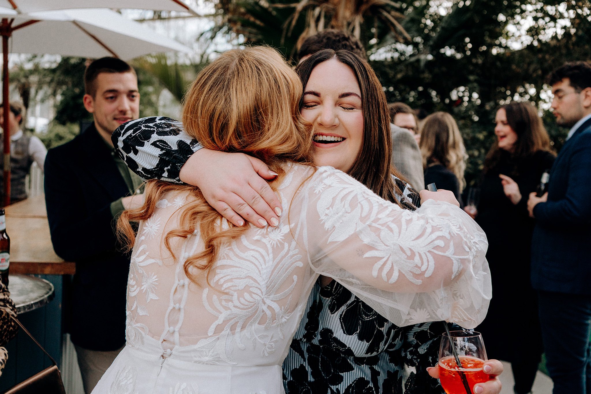 Guest hugging the bride
