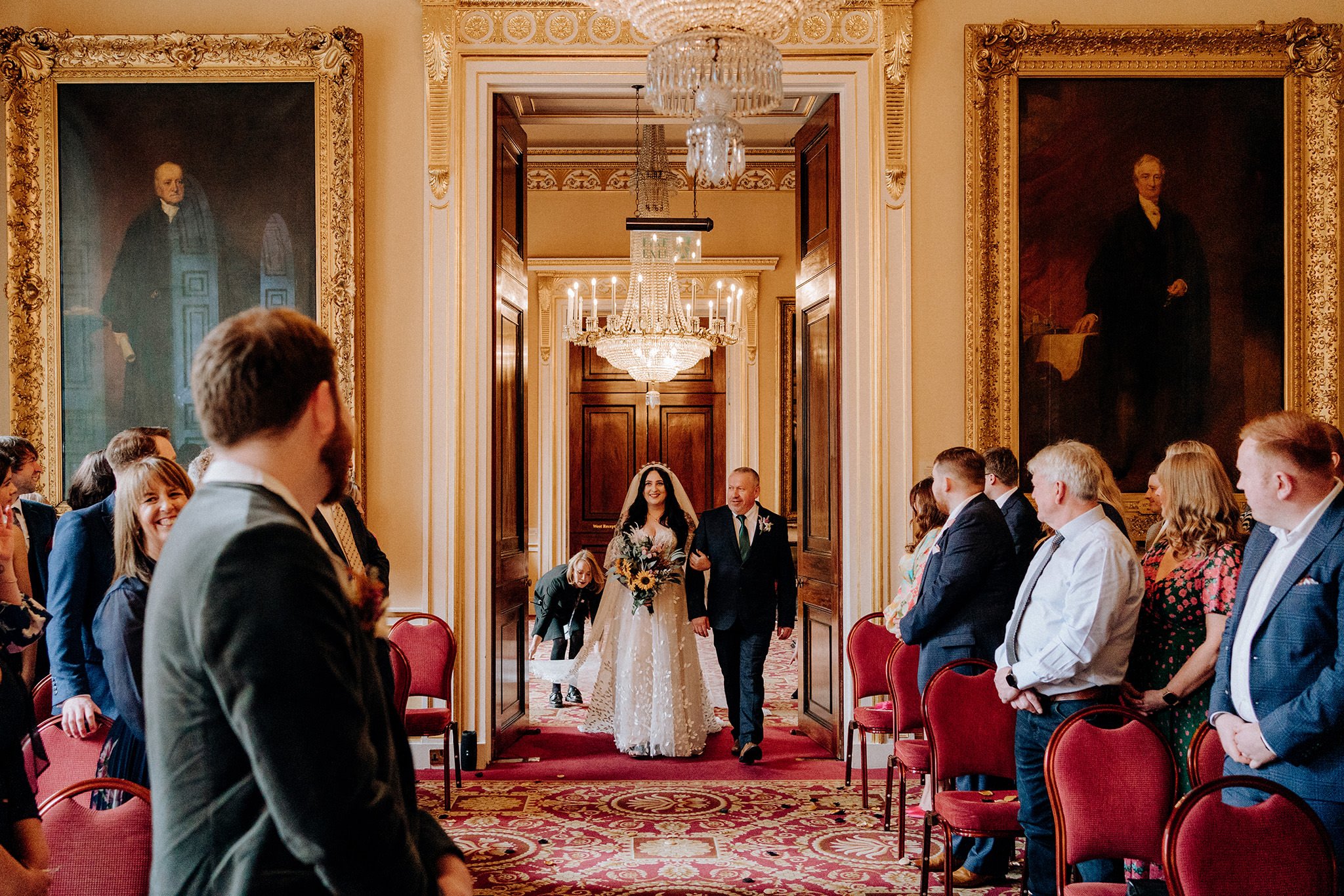 Bride walks down the aisle with her father, Liverpool Town Hall