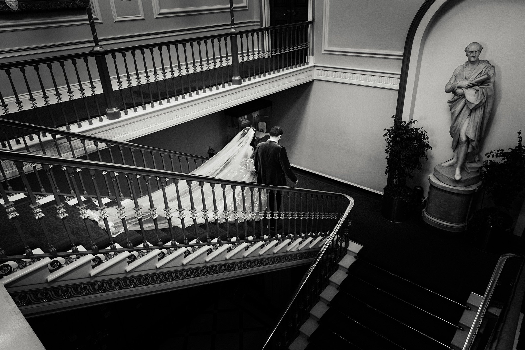 Bride and groom on staircase, Liverpool Town Hall