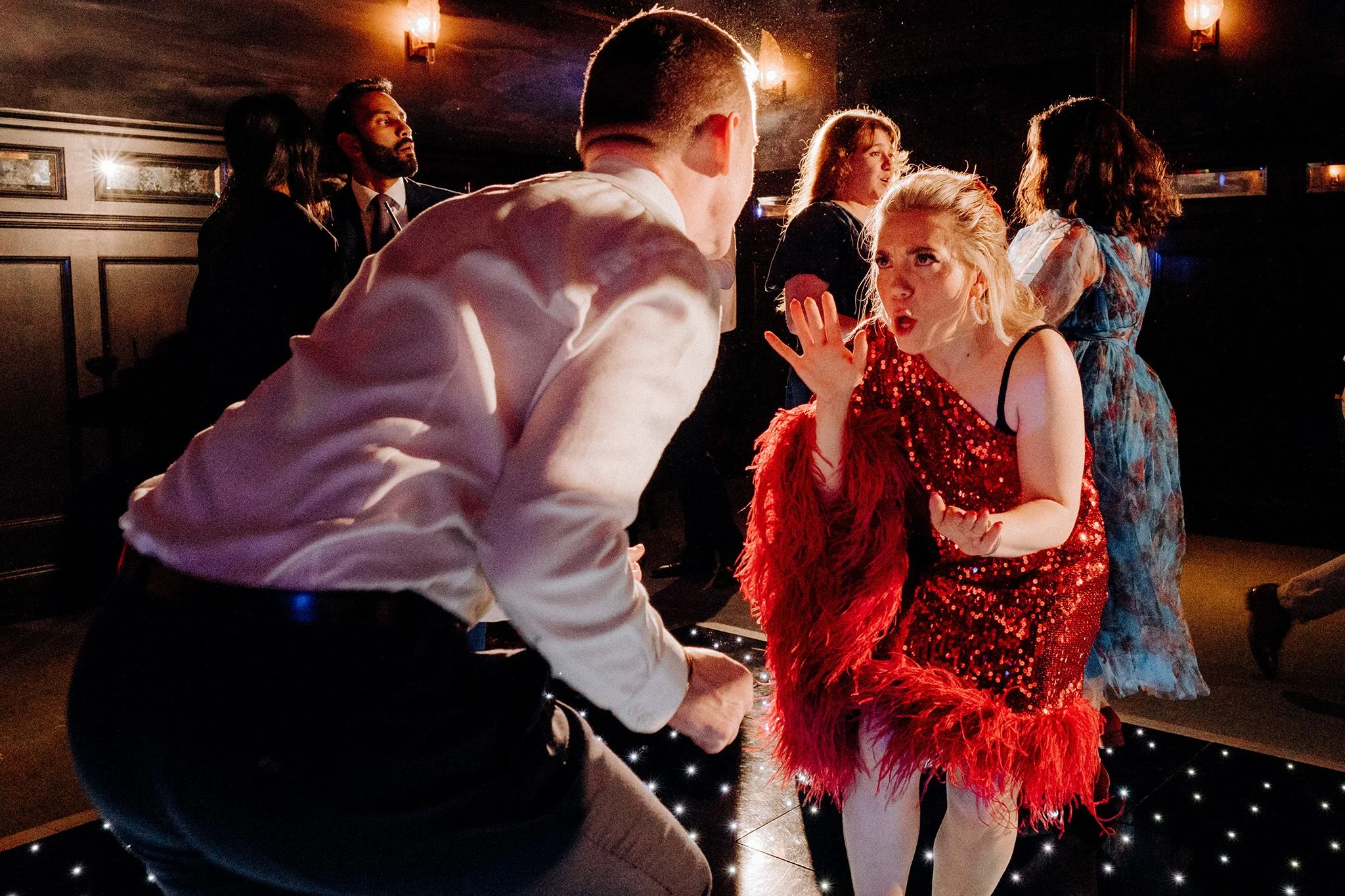 wedding party on the dancefloor at nomad hotel london