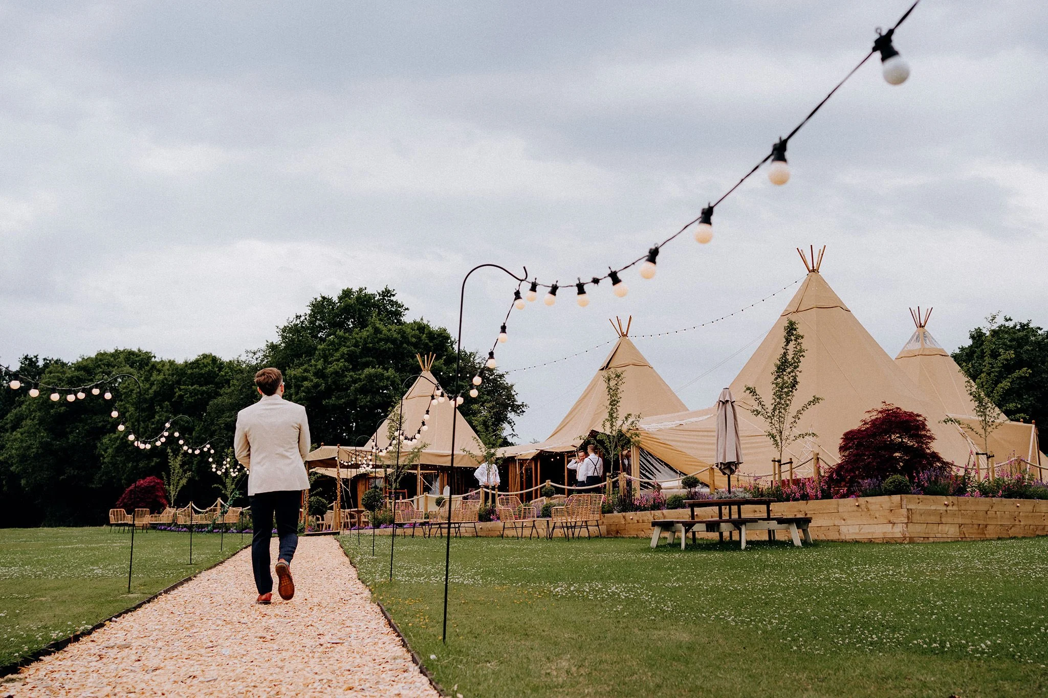 groom arrival for wedding at tipis at riley green