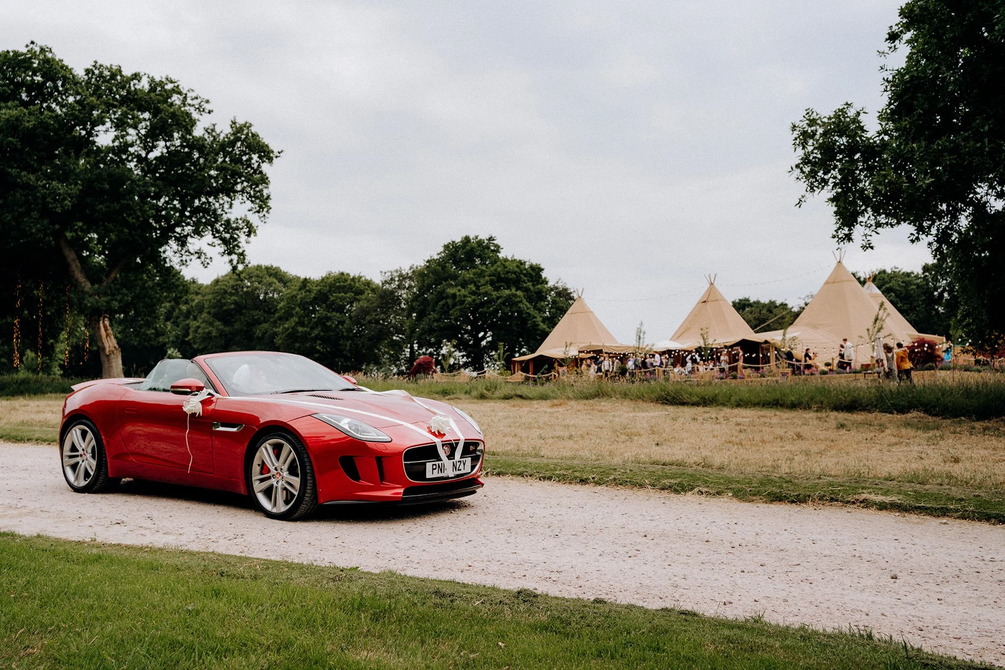 bride arrival at tipis at riley green