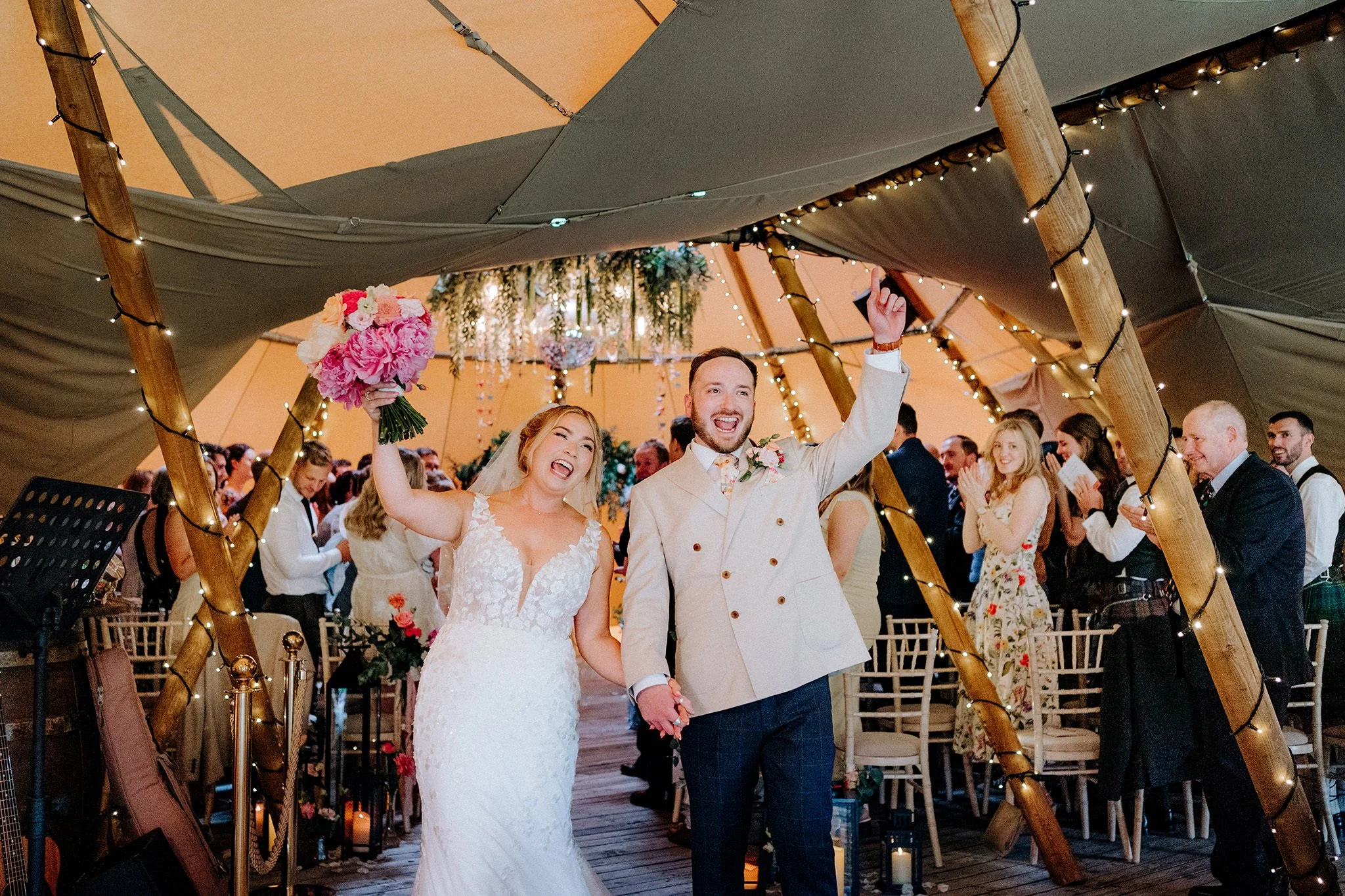 just married at tipis at riley green