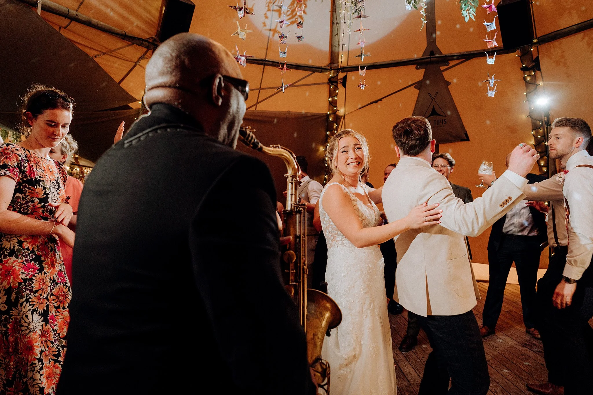 on the dancefloor at the tipis at riley green