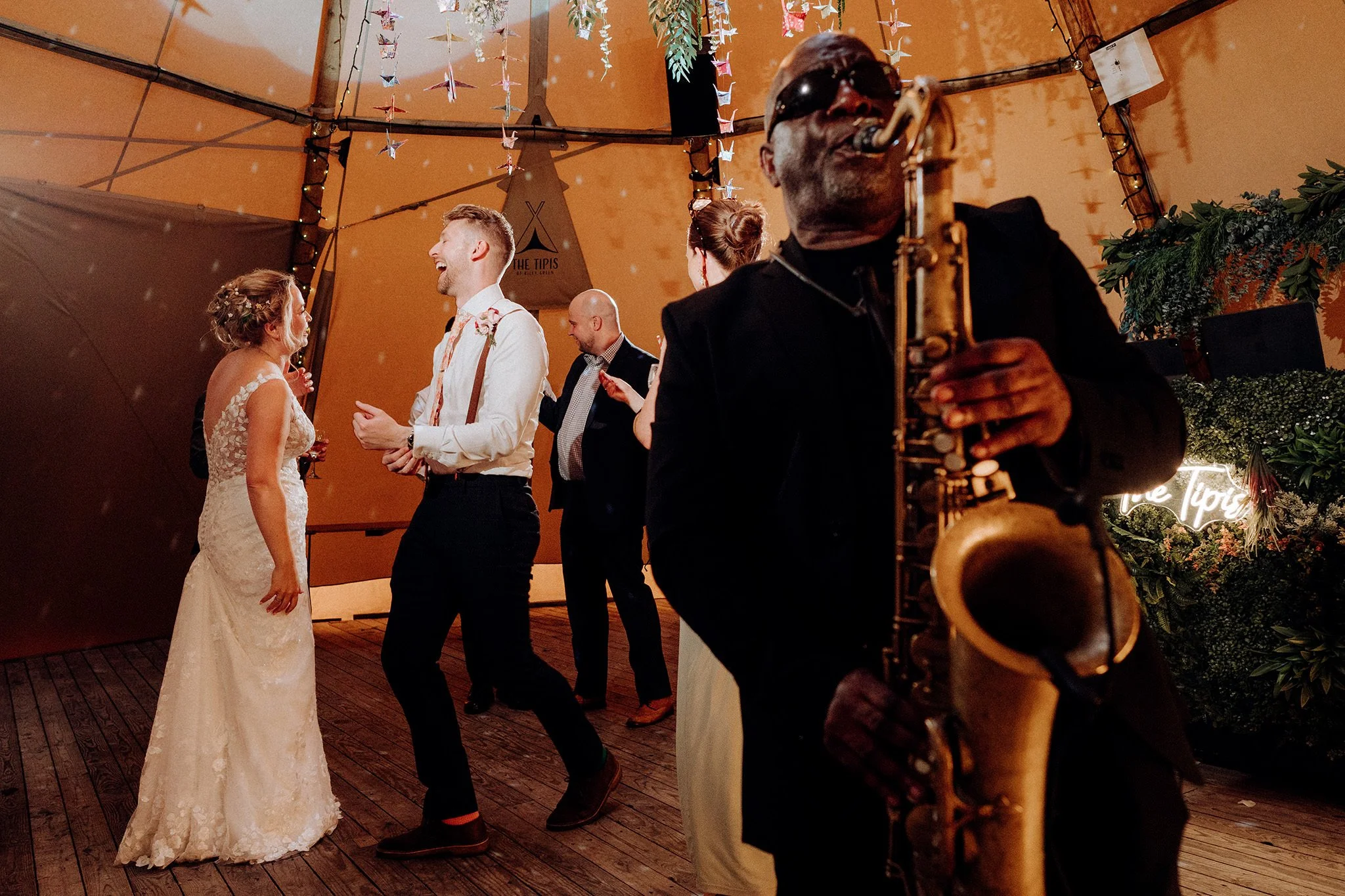 on the dancefloor at the tipis at riley green