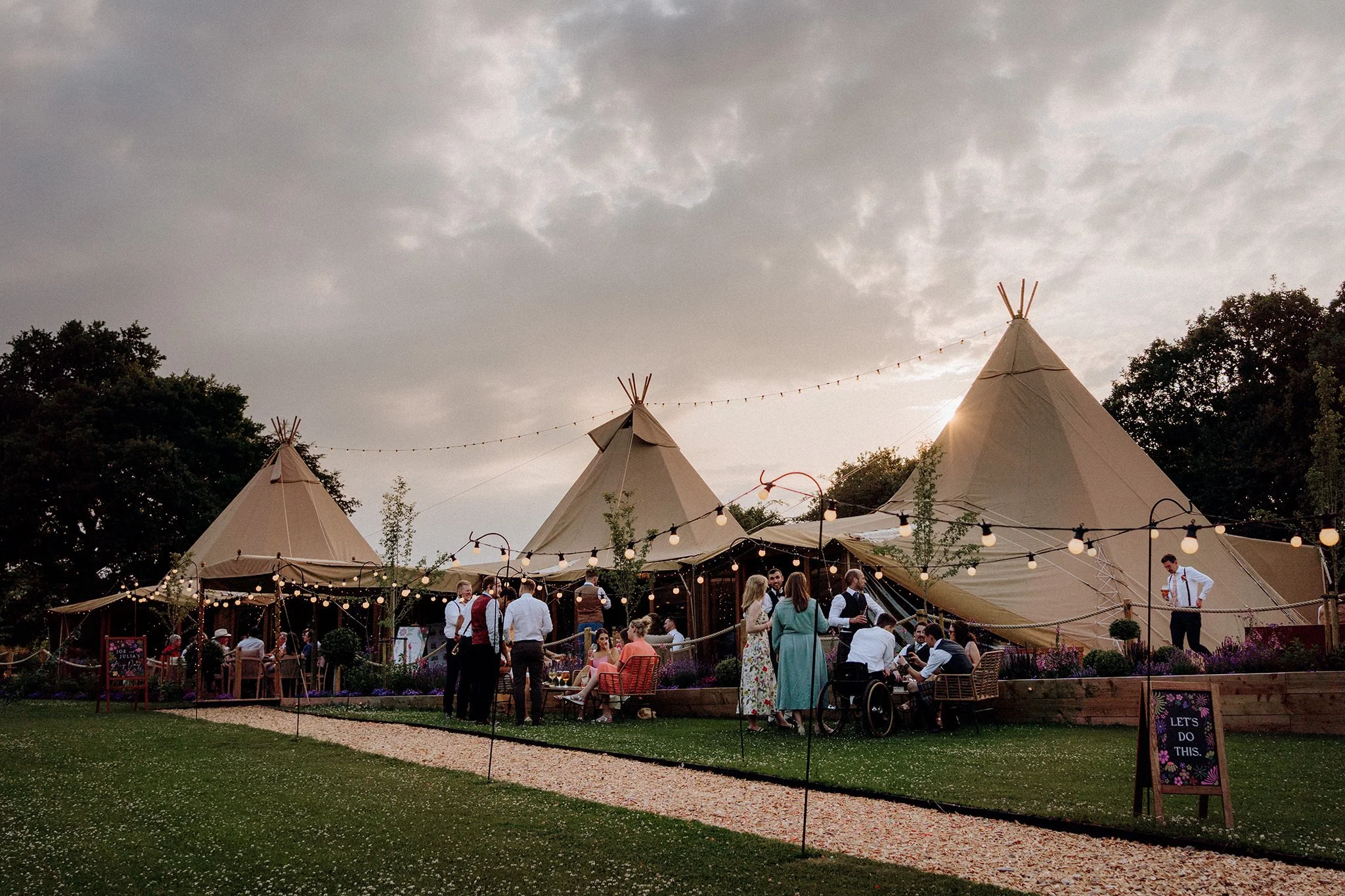 sun setting at tipis at riley green