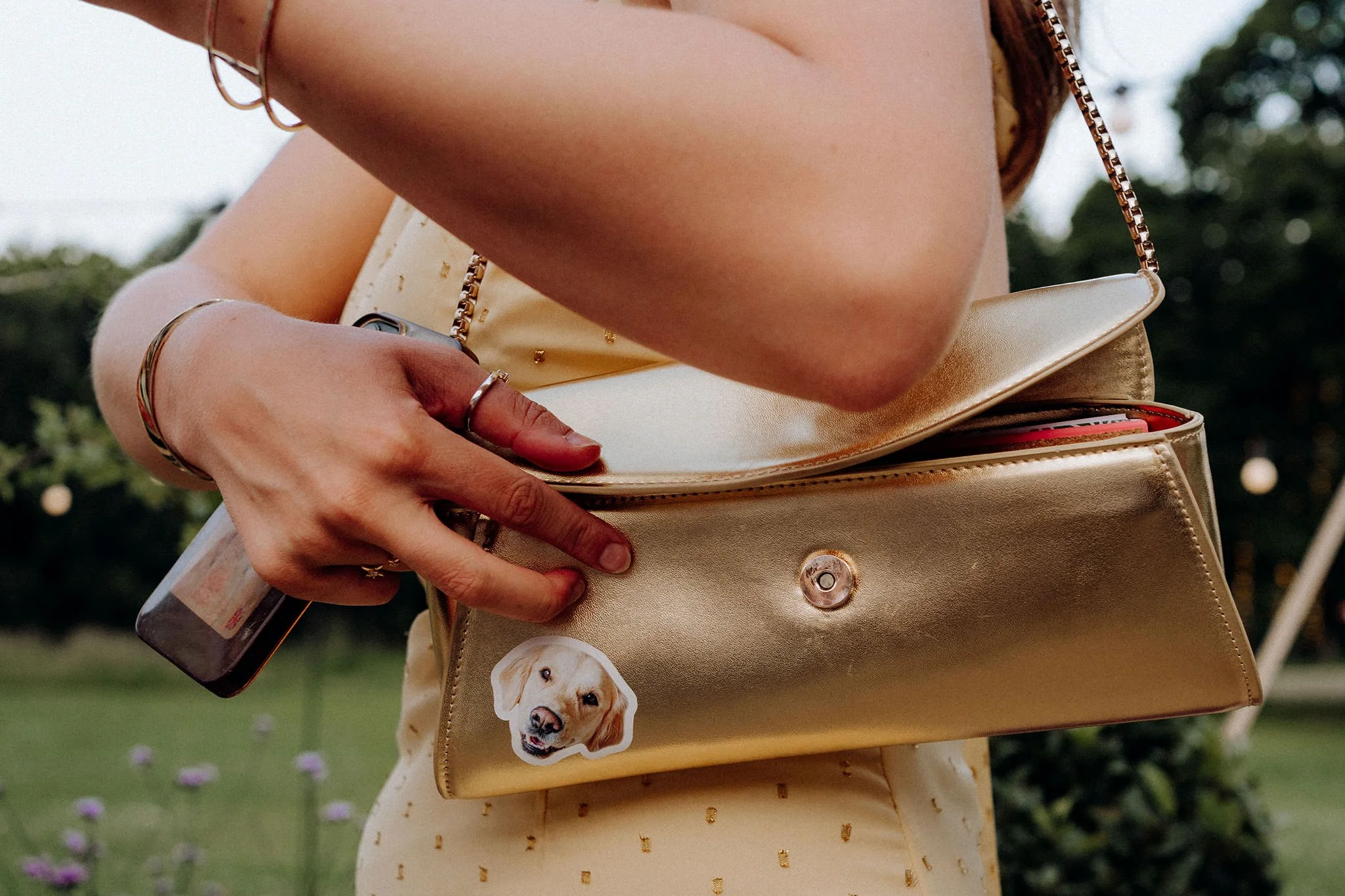 dog sticker on the handbag