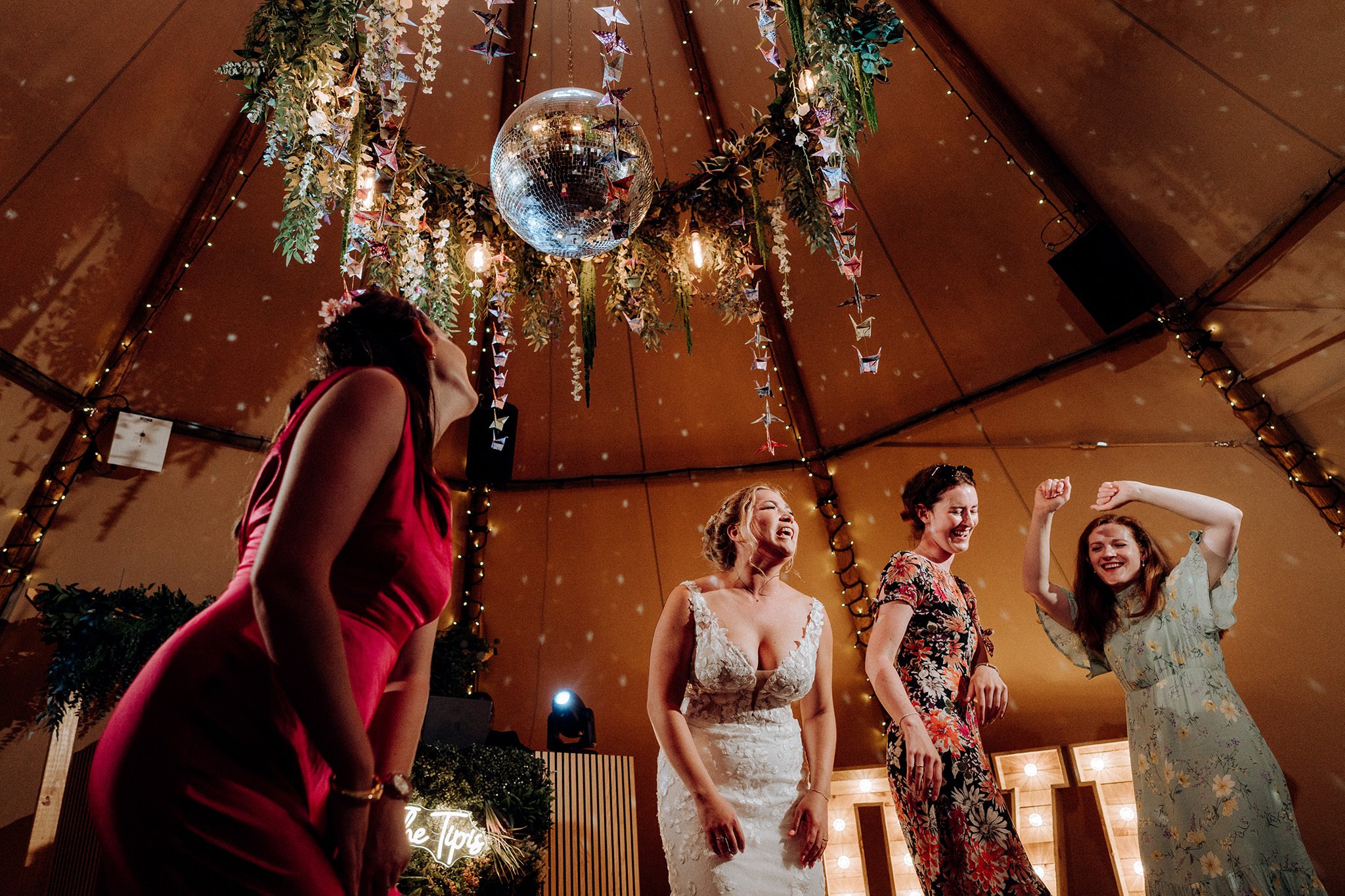 on the dancefloor at the tipis at riley green