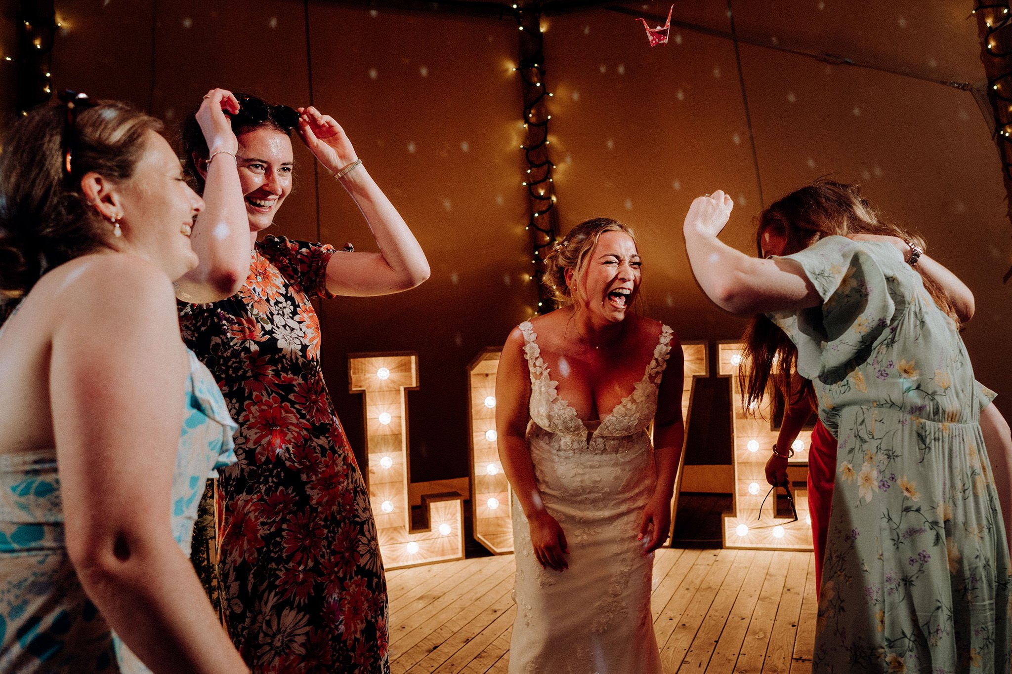on the dancefloor at the tipis at riley green