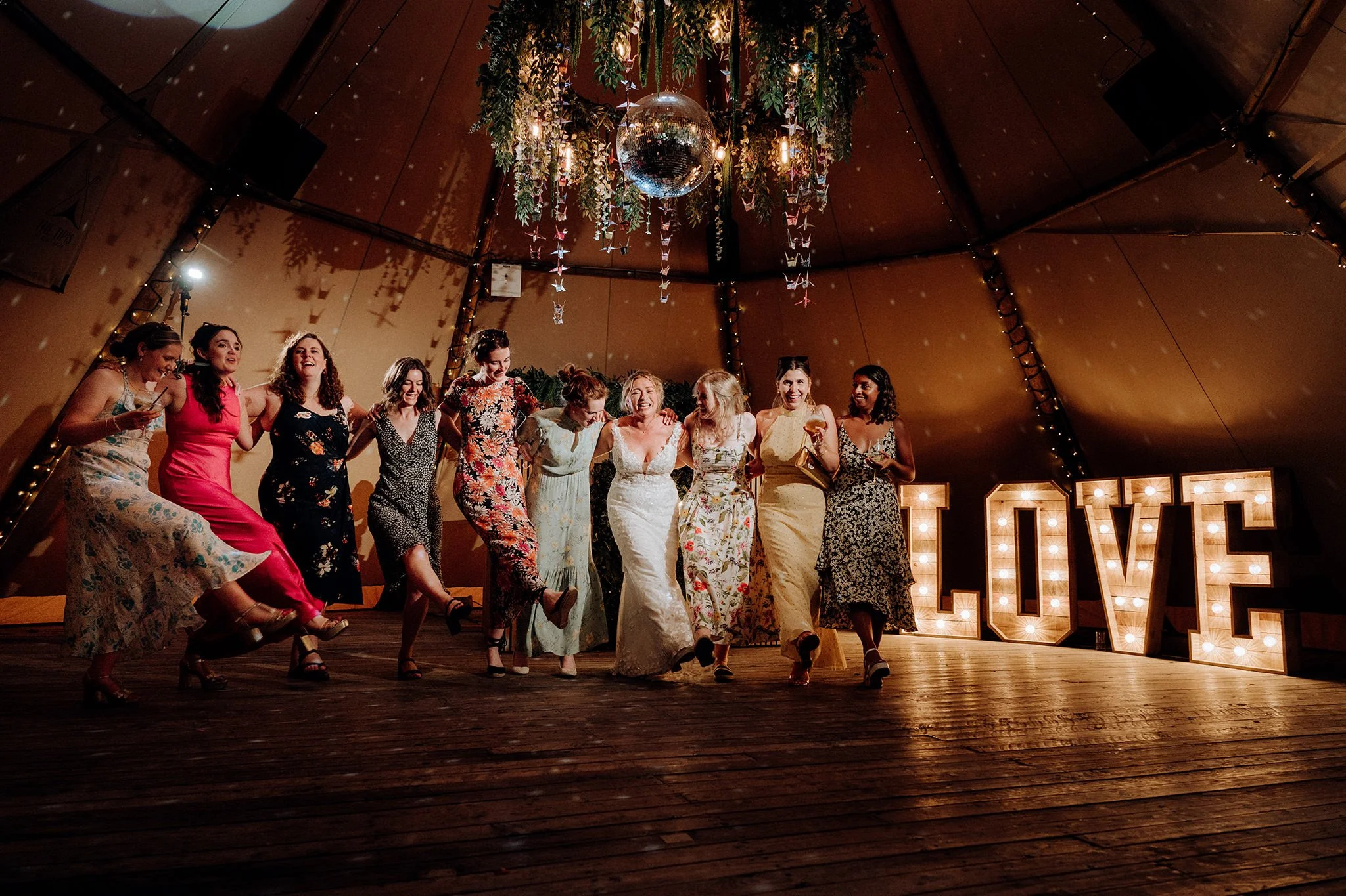 on the dancefloor at the tipis at riley green