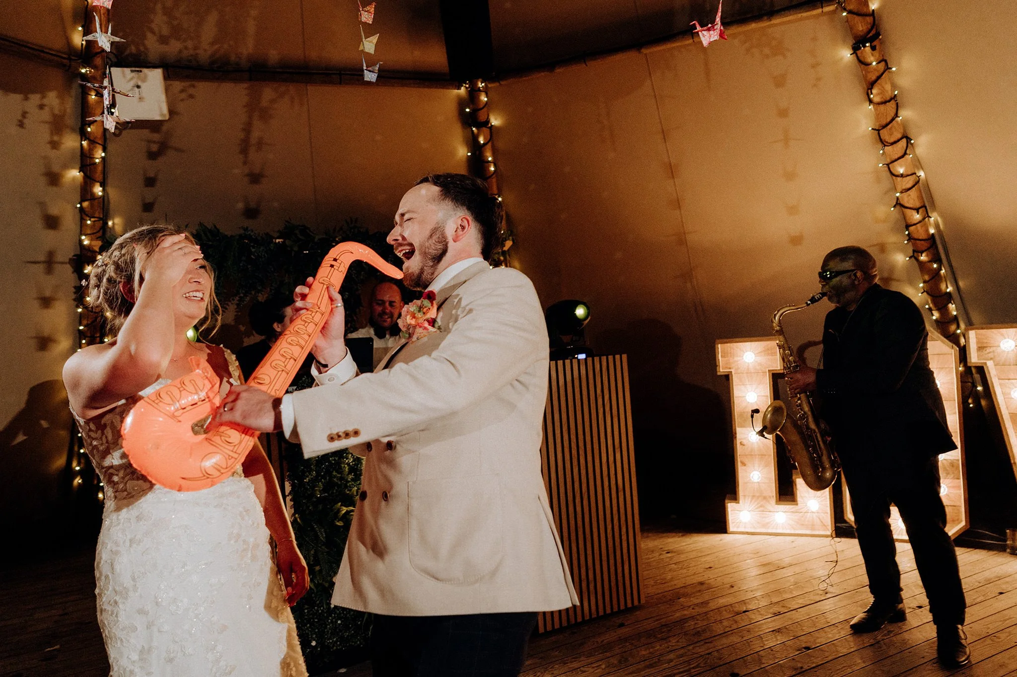 on the dancefloor at the tipis at riley green