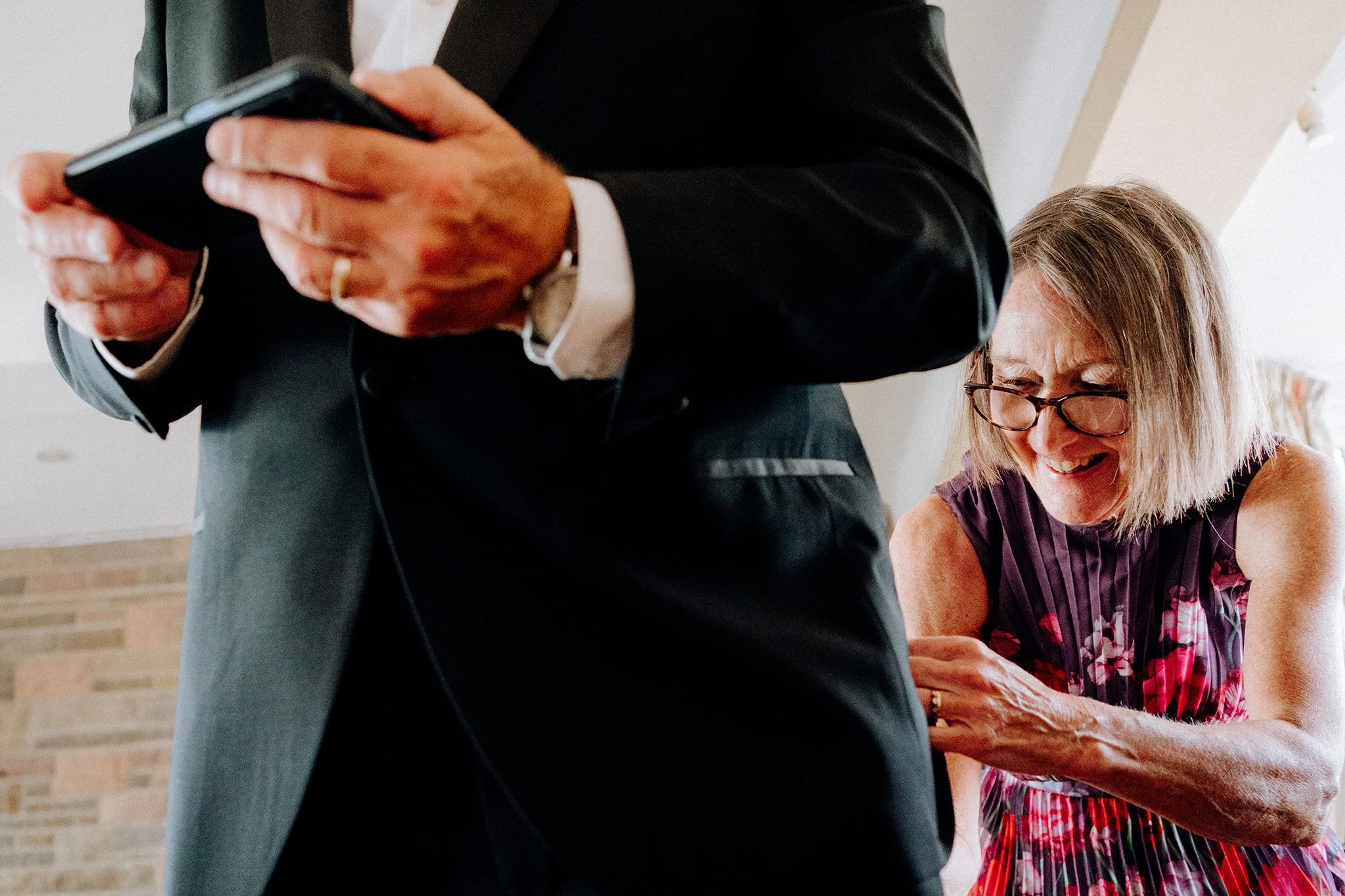 mum helping get ready on morning of the wedding
