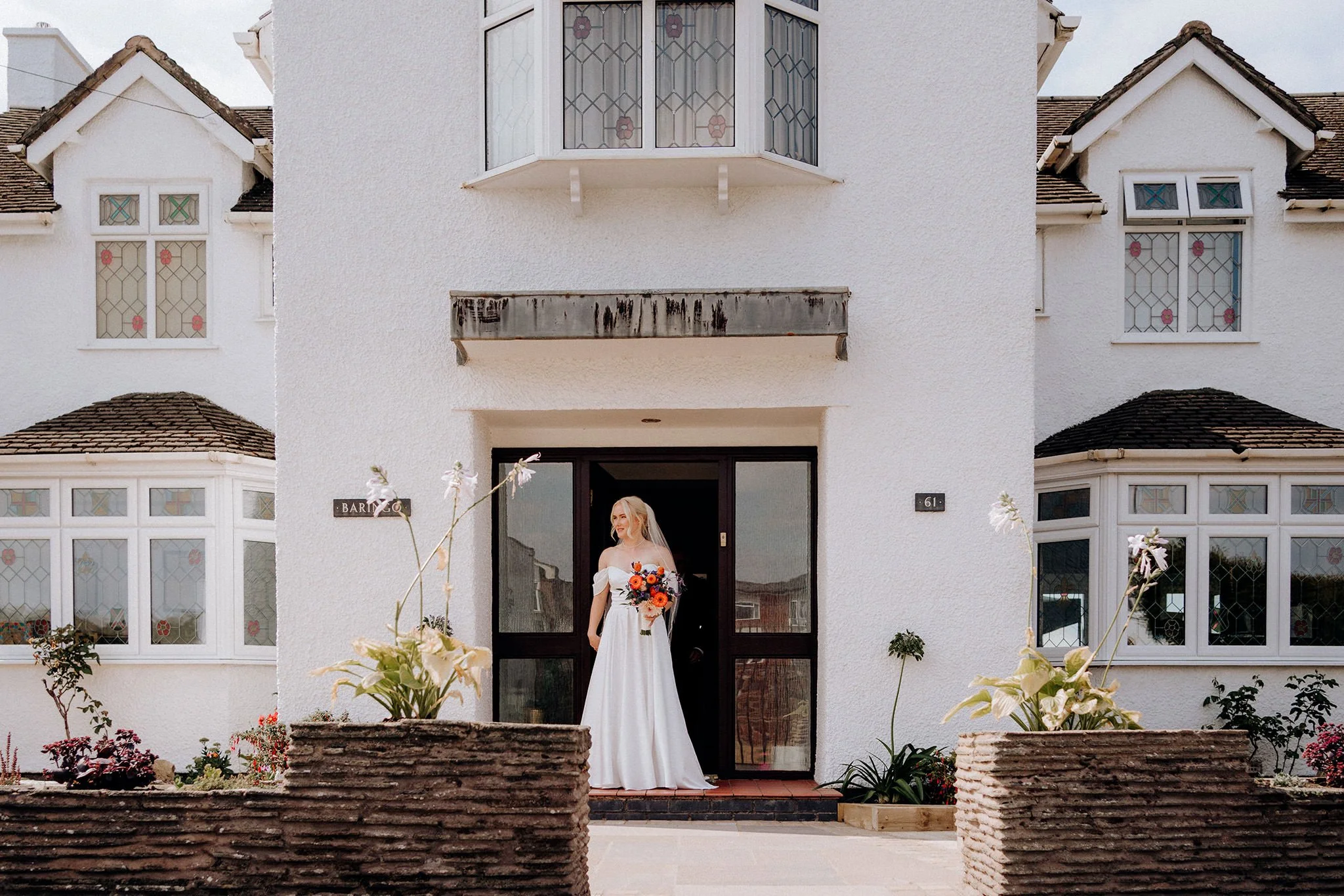 bride leaving family home on morning of wedding