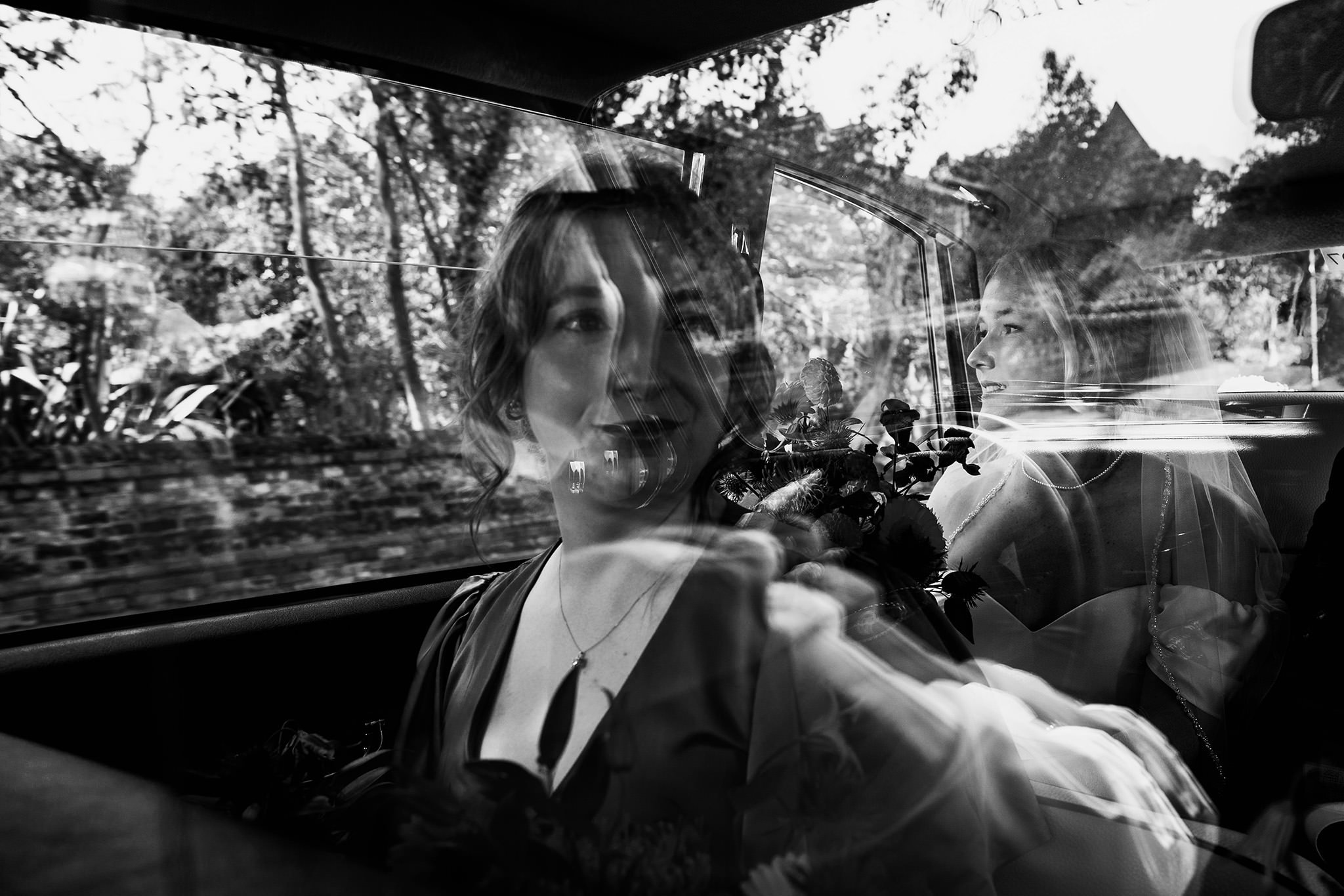 bride in car on the way to her wedding in crosby