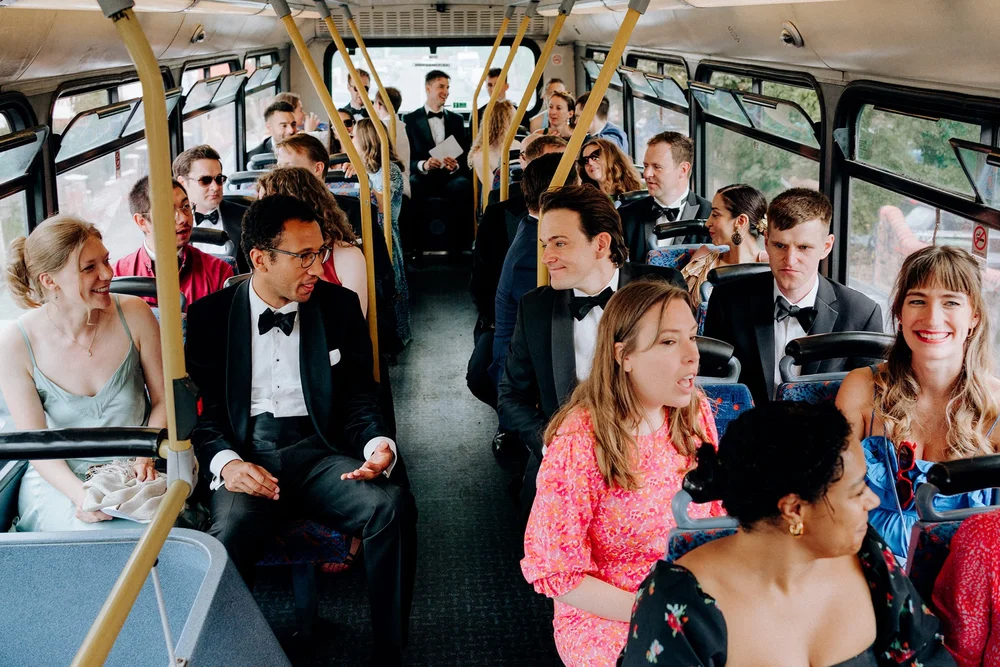 wedding guests on the bus
