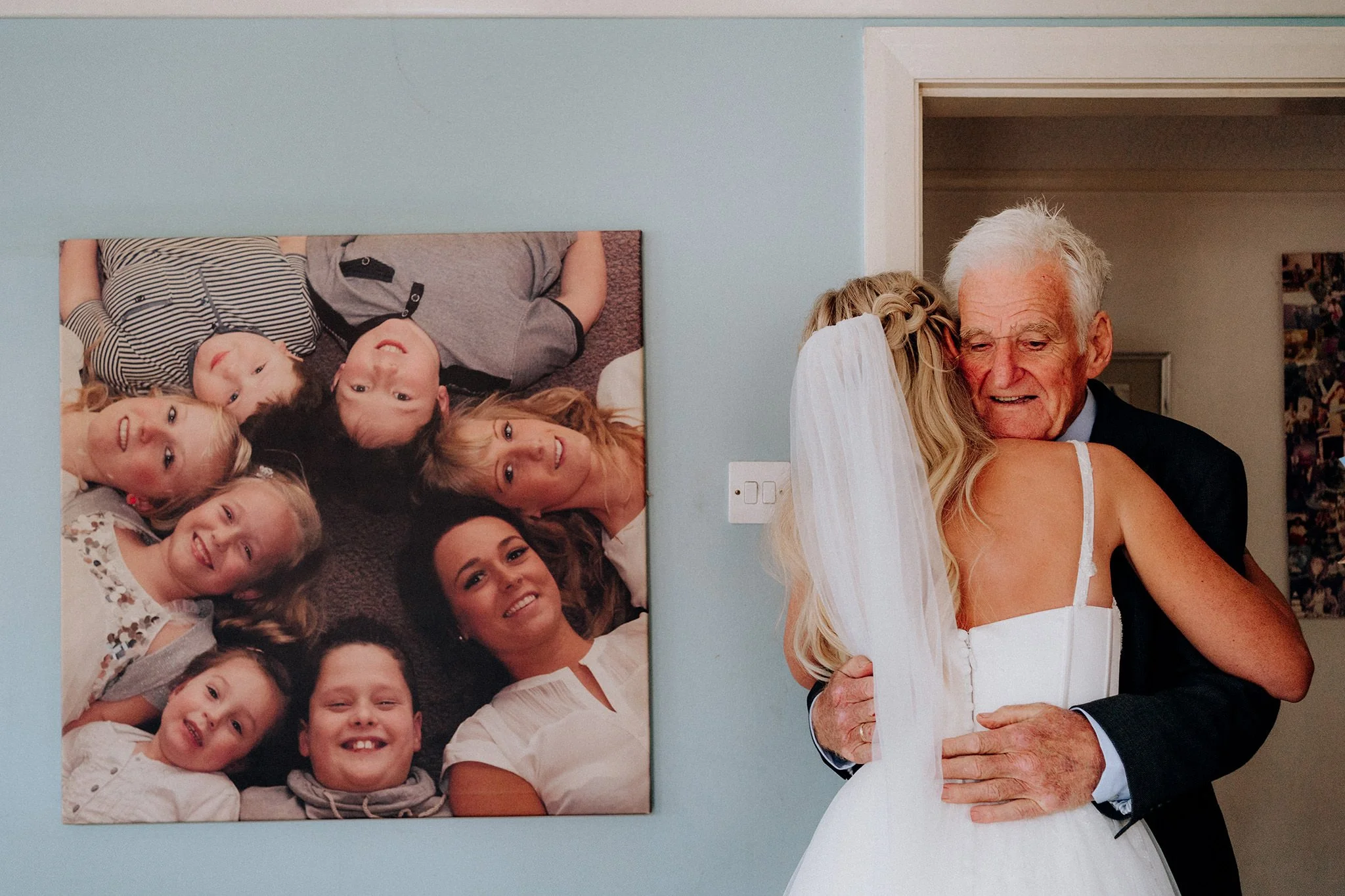 bride and grandad hug