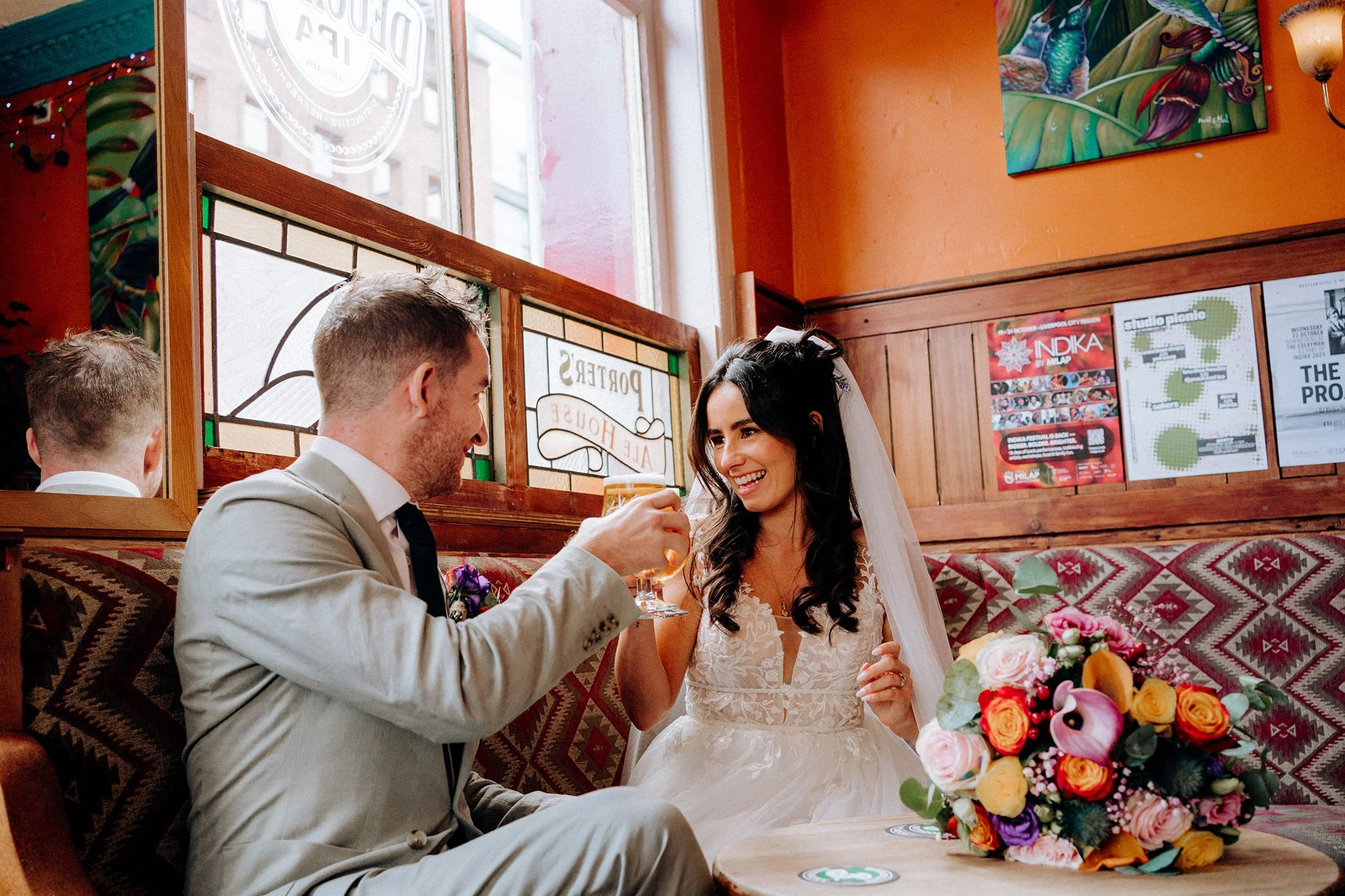 the grapes pub wedding bride and groom grab a drink