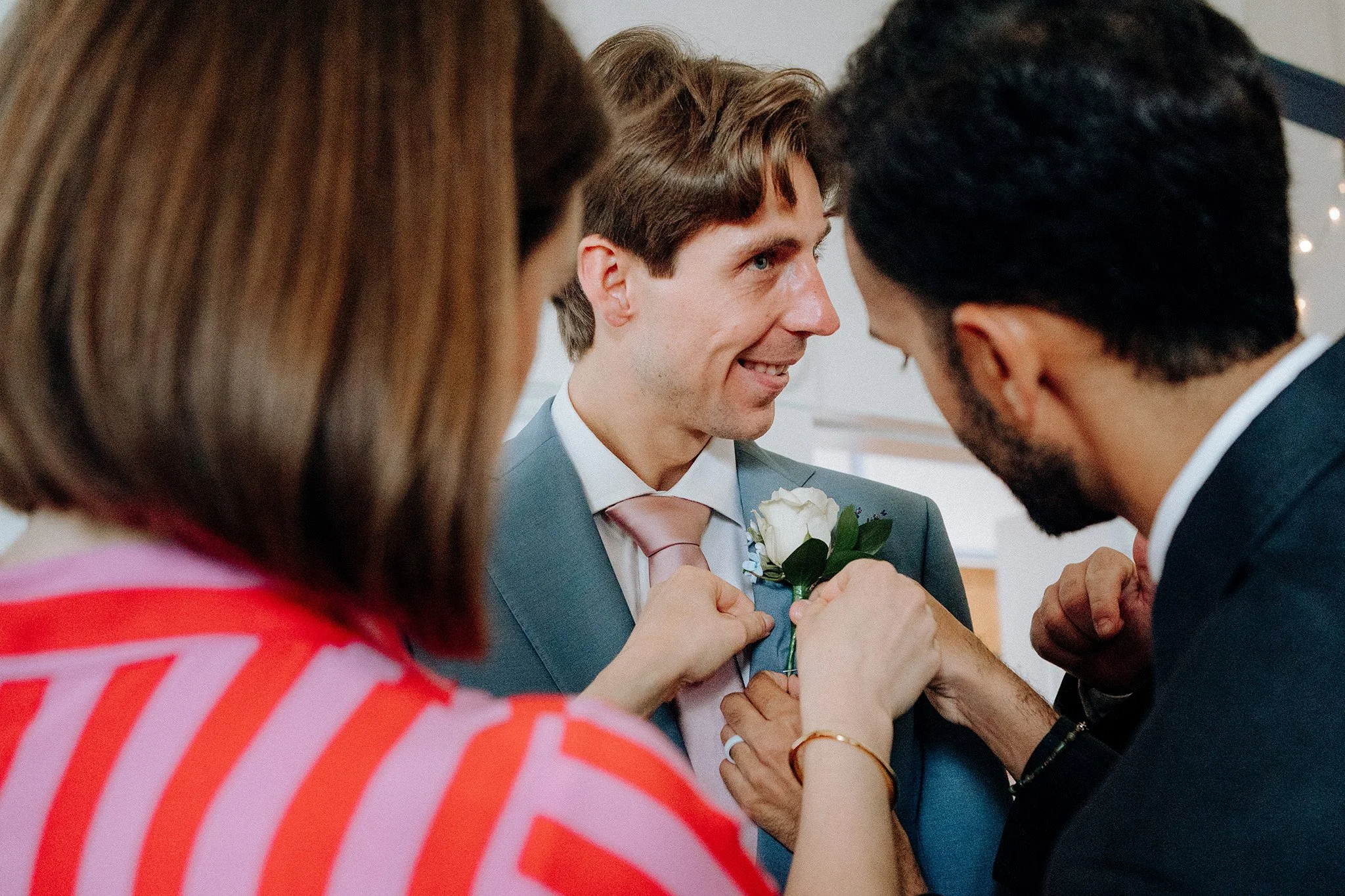 groom getting ready village hall wedding