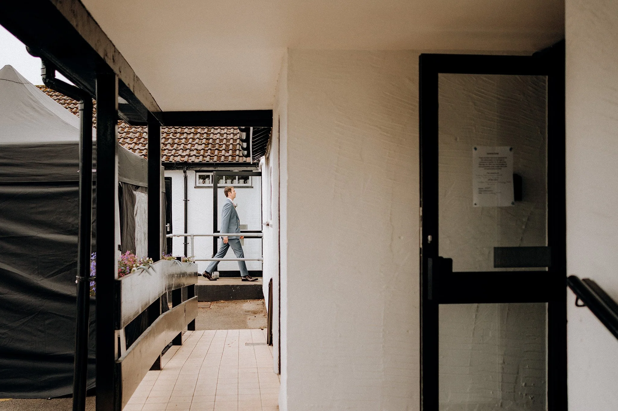 arriving for a village hall wedding 