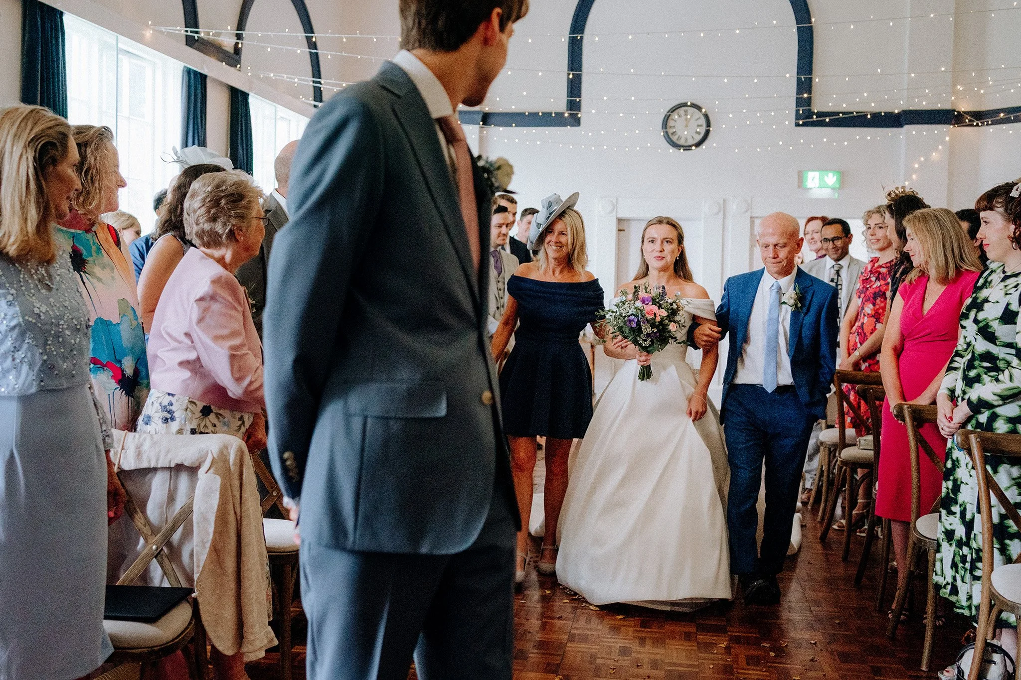 bride walking down the aisle village hall wedding 