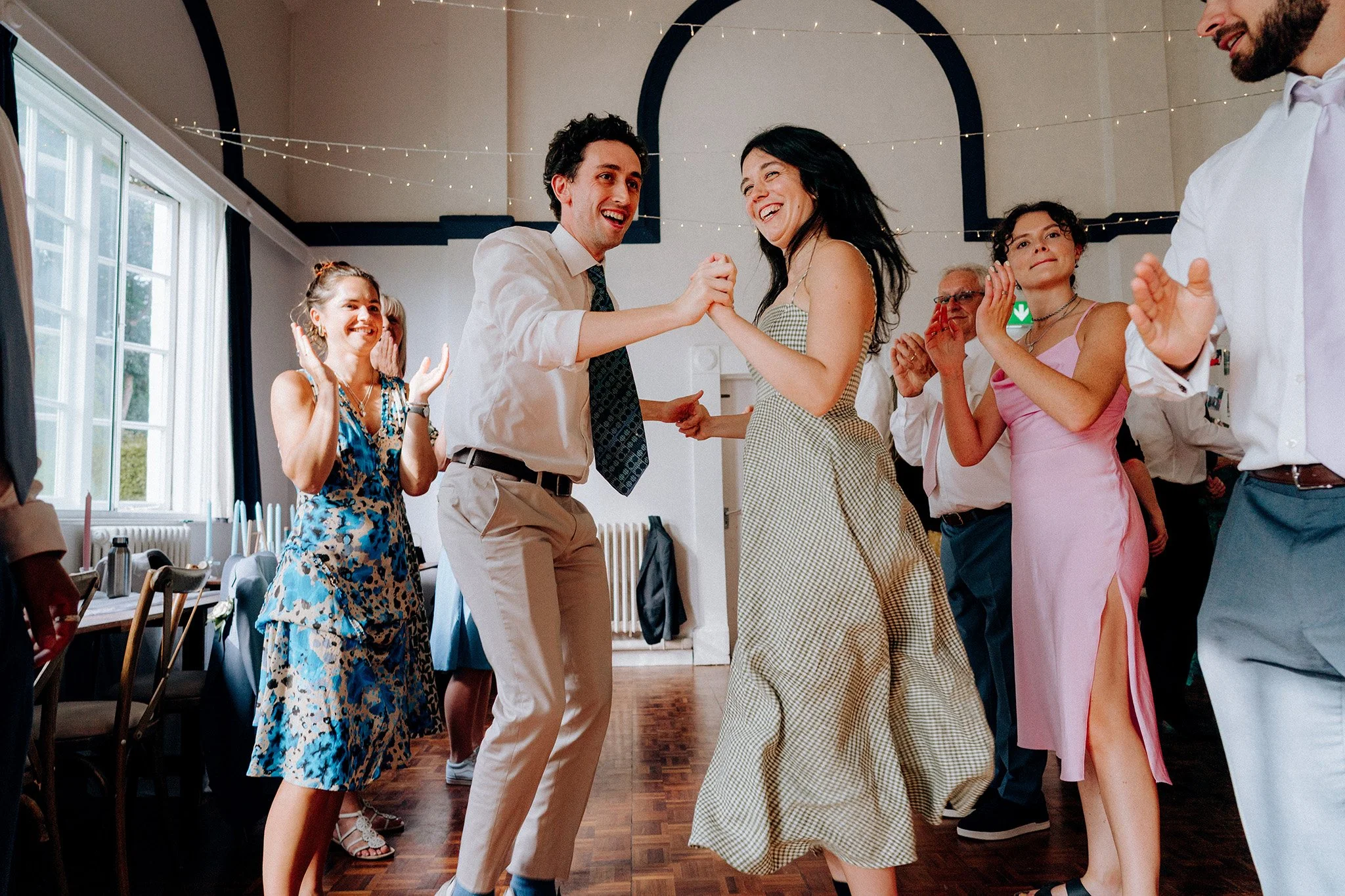 ceilidh fun at a village hall wedding 