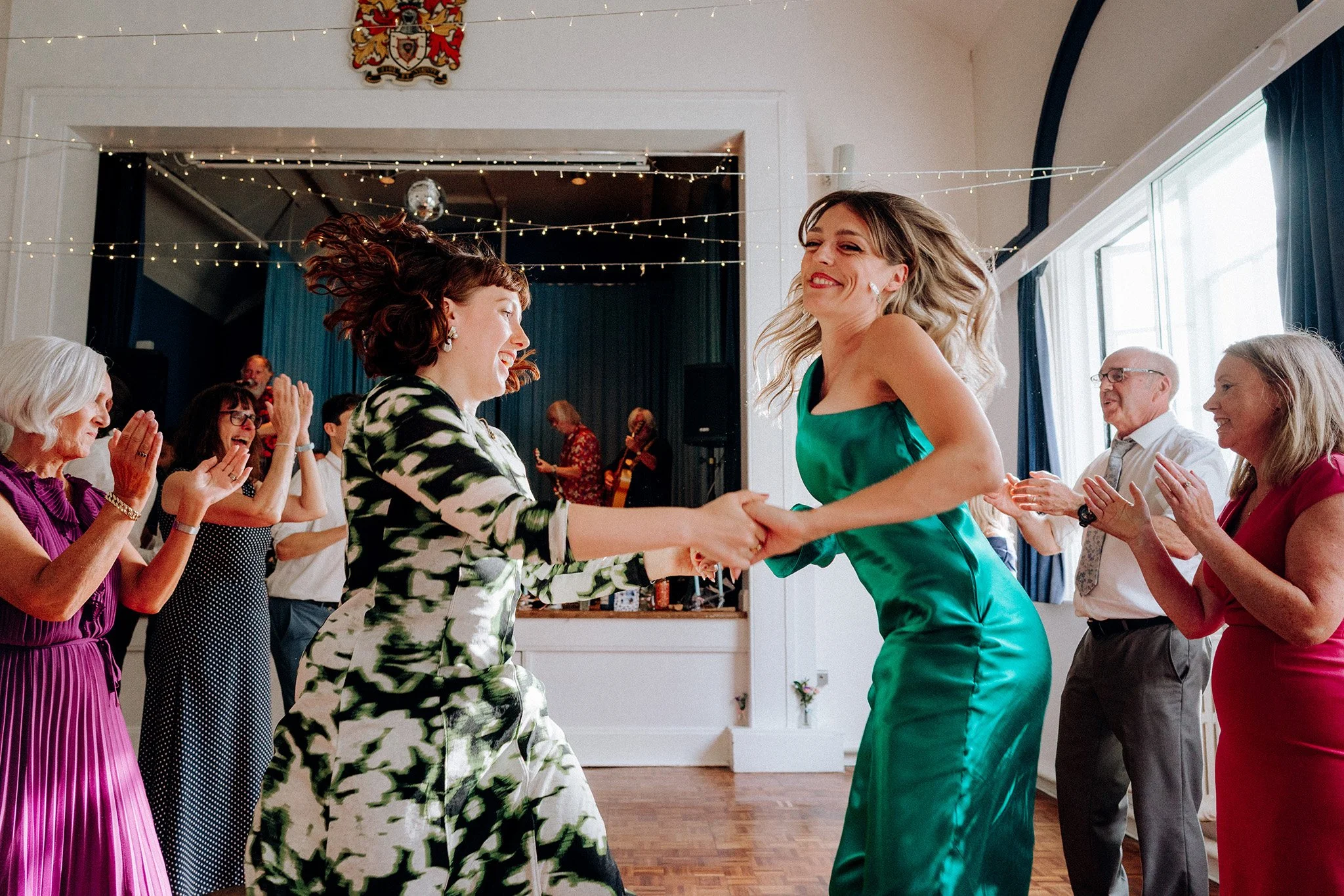 ceilidh fun at a village hall wedding 