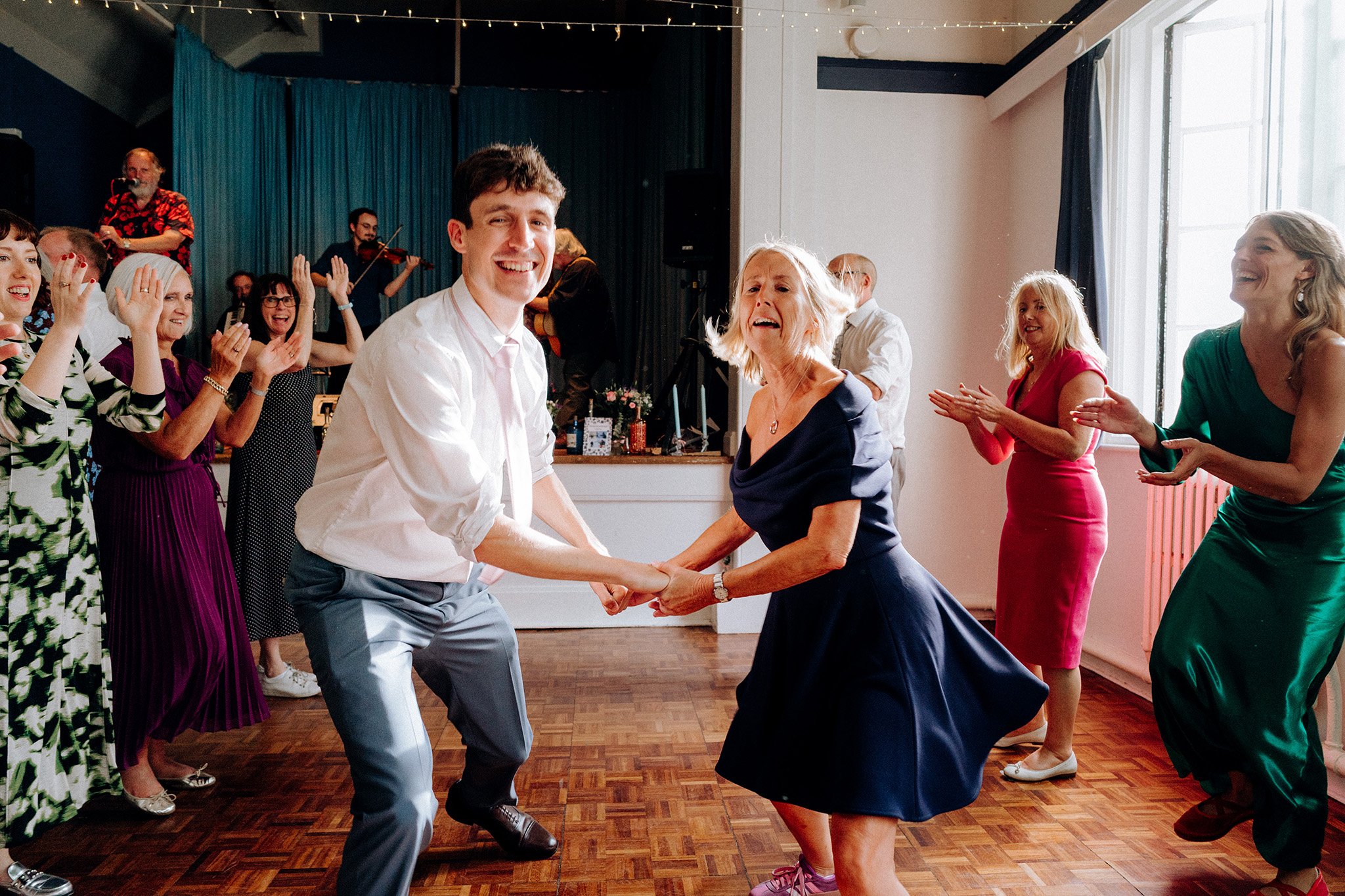 ceilidh fun at a village hall wedding 