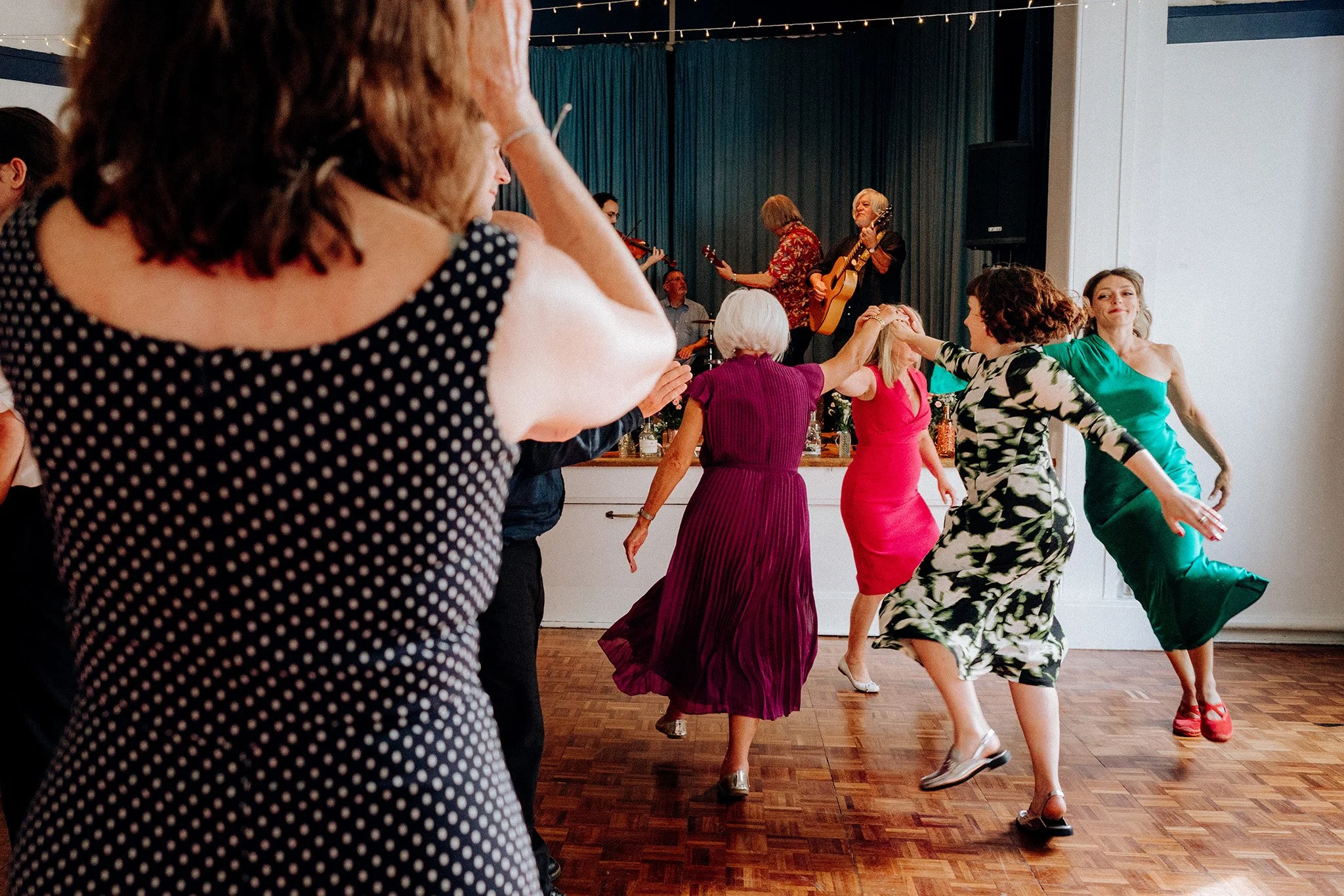 ceilidh fun at a village hall wedding 