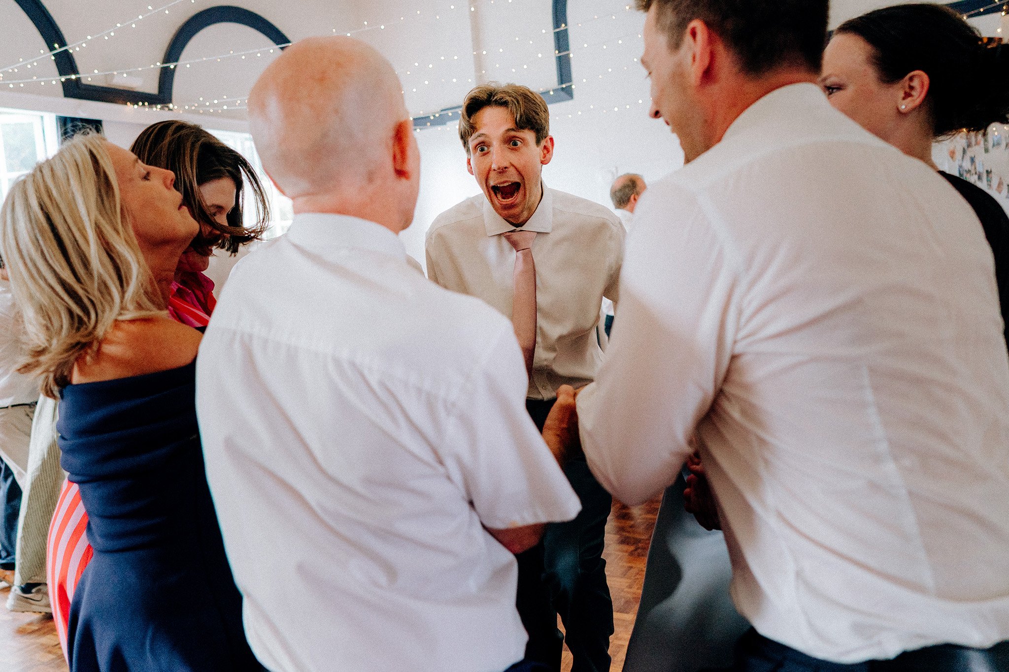 ceilidh fun at a village hall wedding 