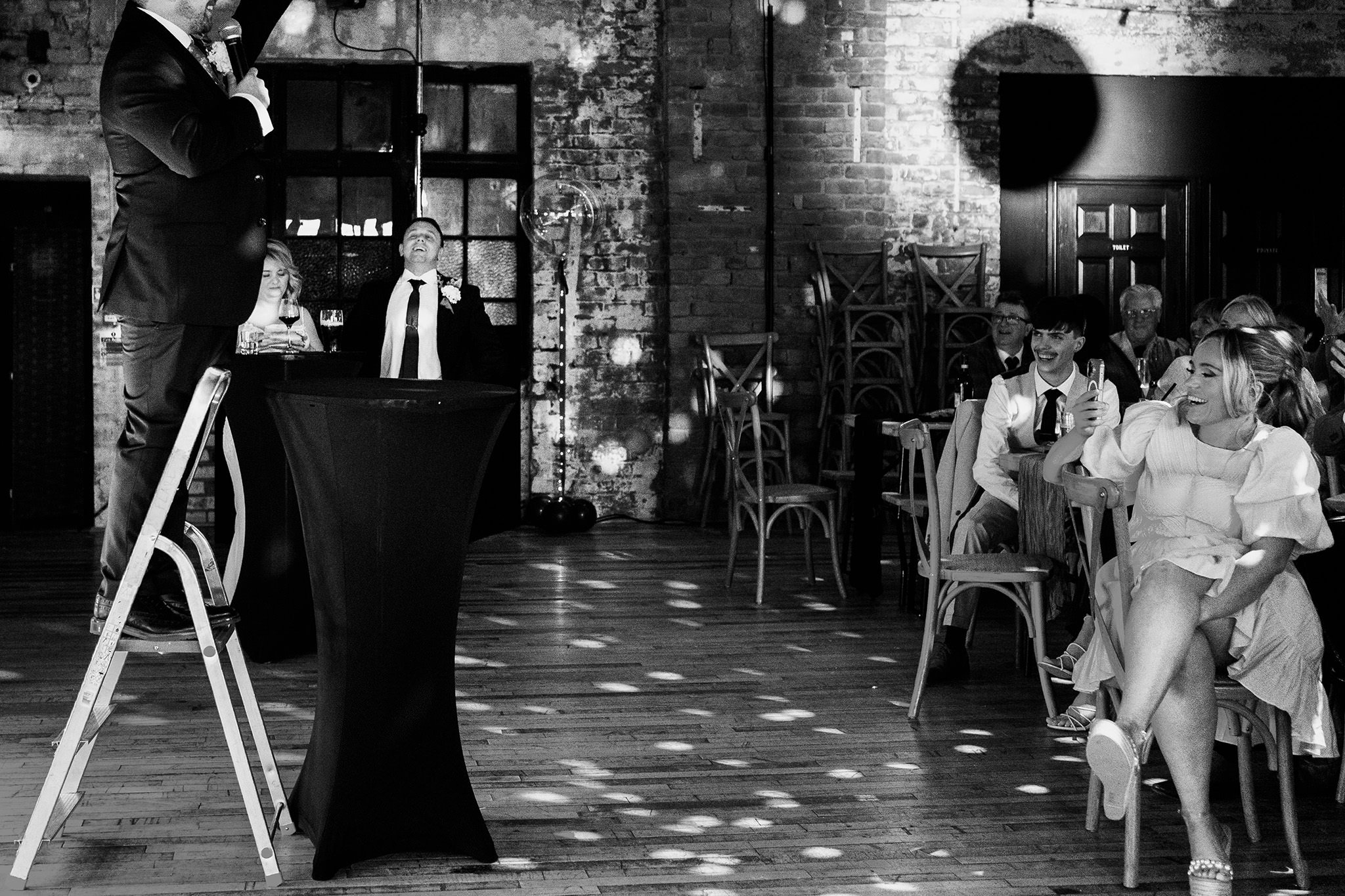 giving a speech stood on a ladder so guests can see you at scale liverpool