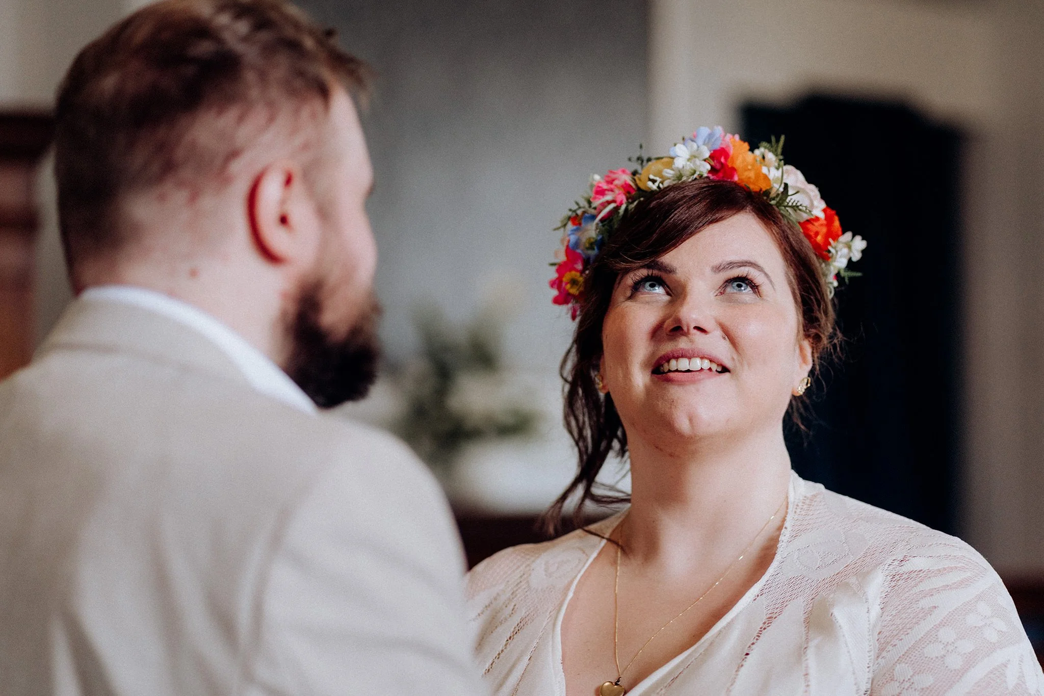 bride looks up, emotional moment during wedding ceremony