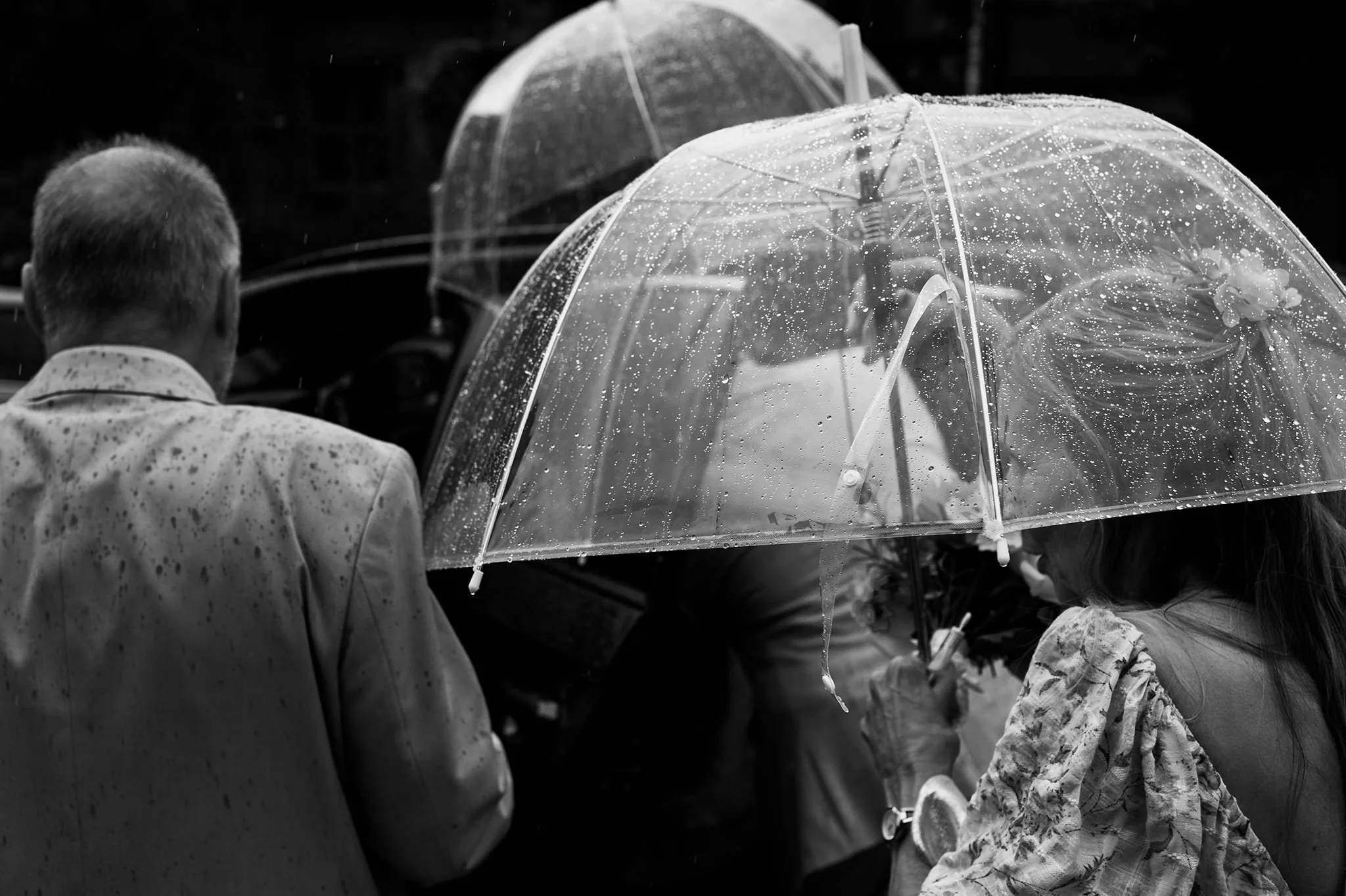 rain umbrellas at crosby town hall wedding