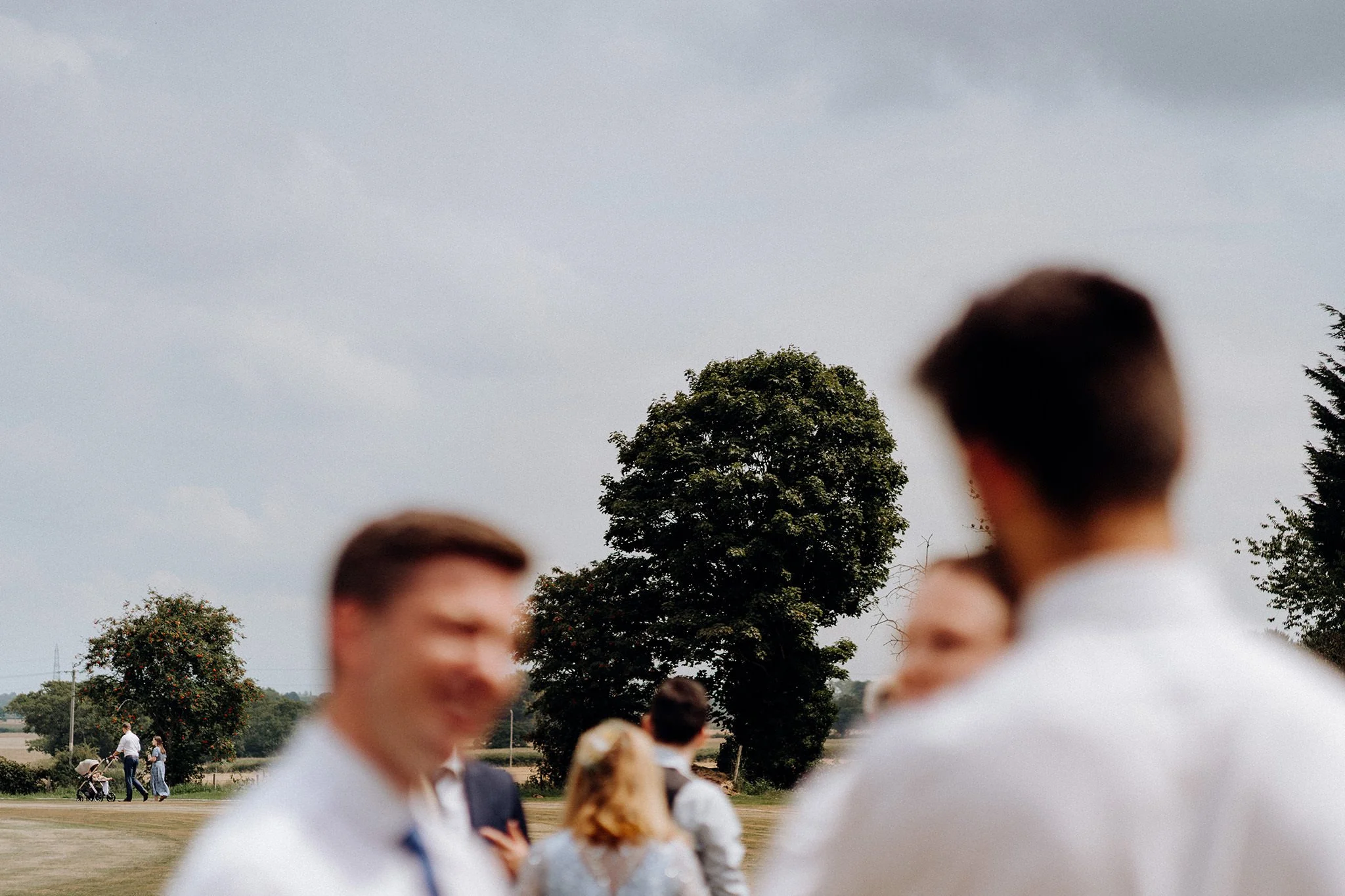 wedding guests taking baby for a stroll to get them to sleep
