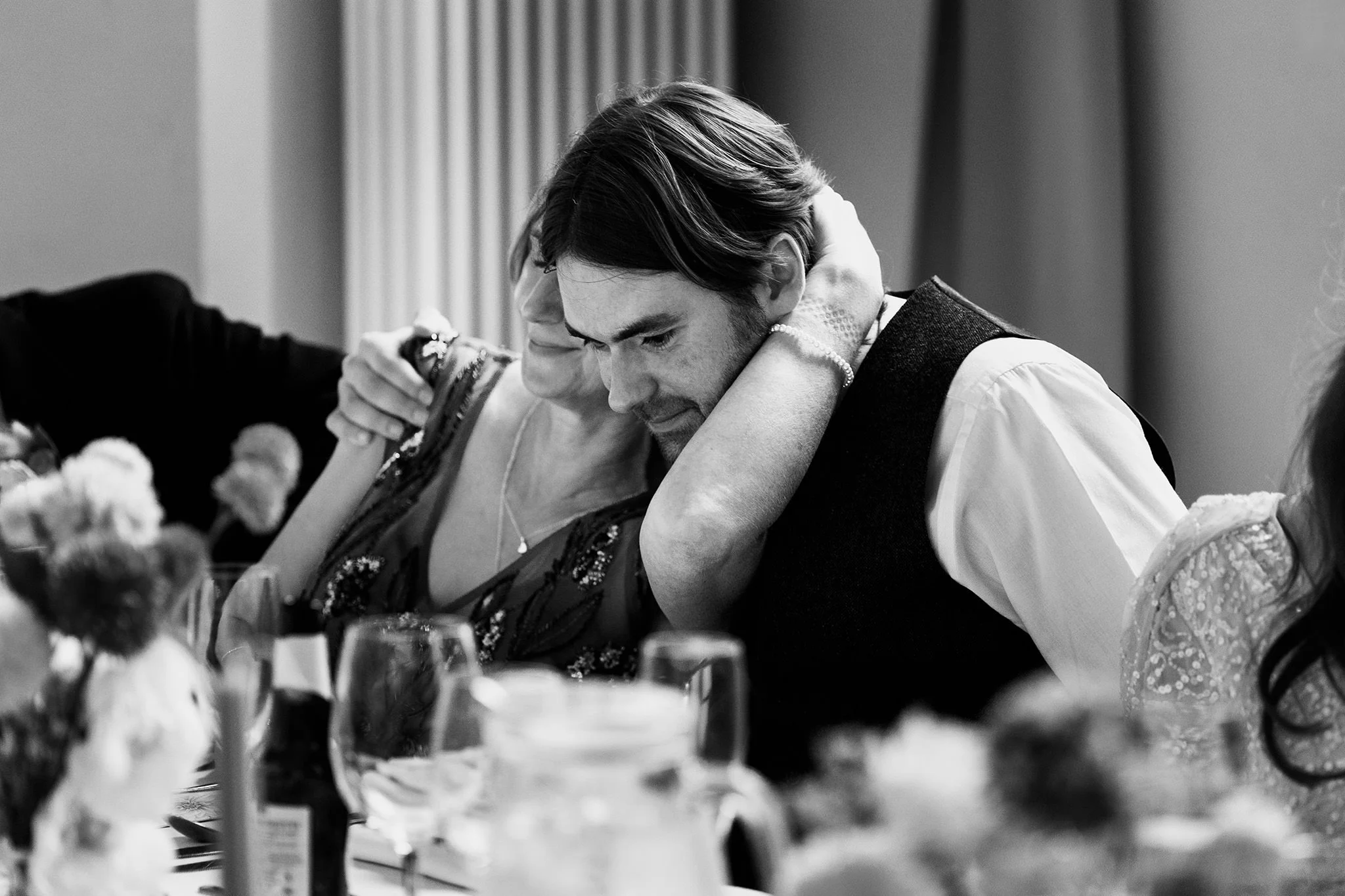 a quiet moment, mother and son on his wedding day at the bluecoat liverpool