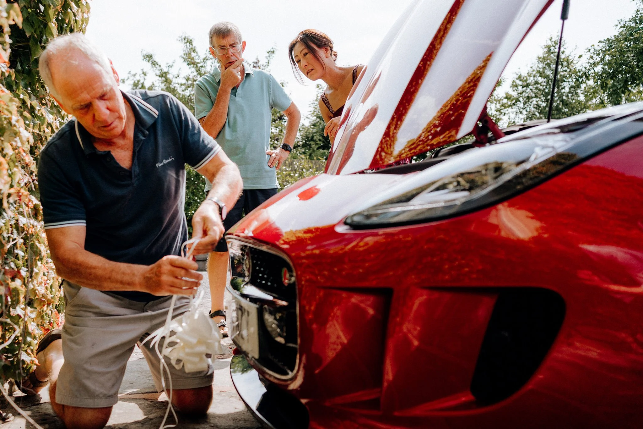 getting the bride's car ready for the wedding