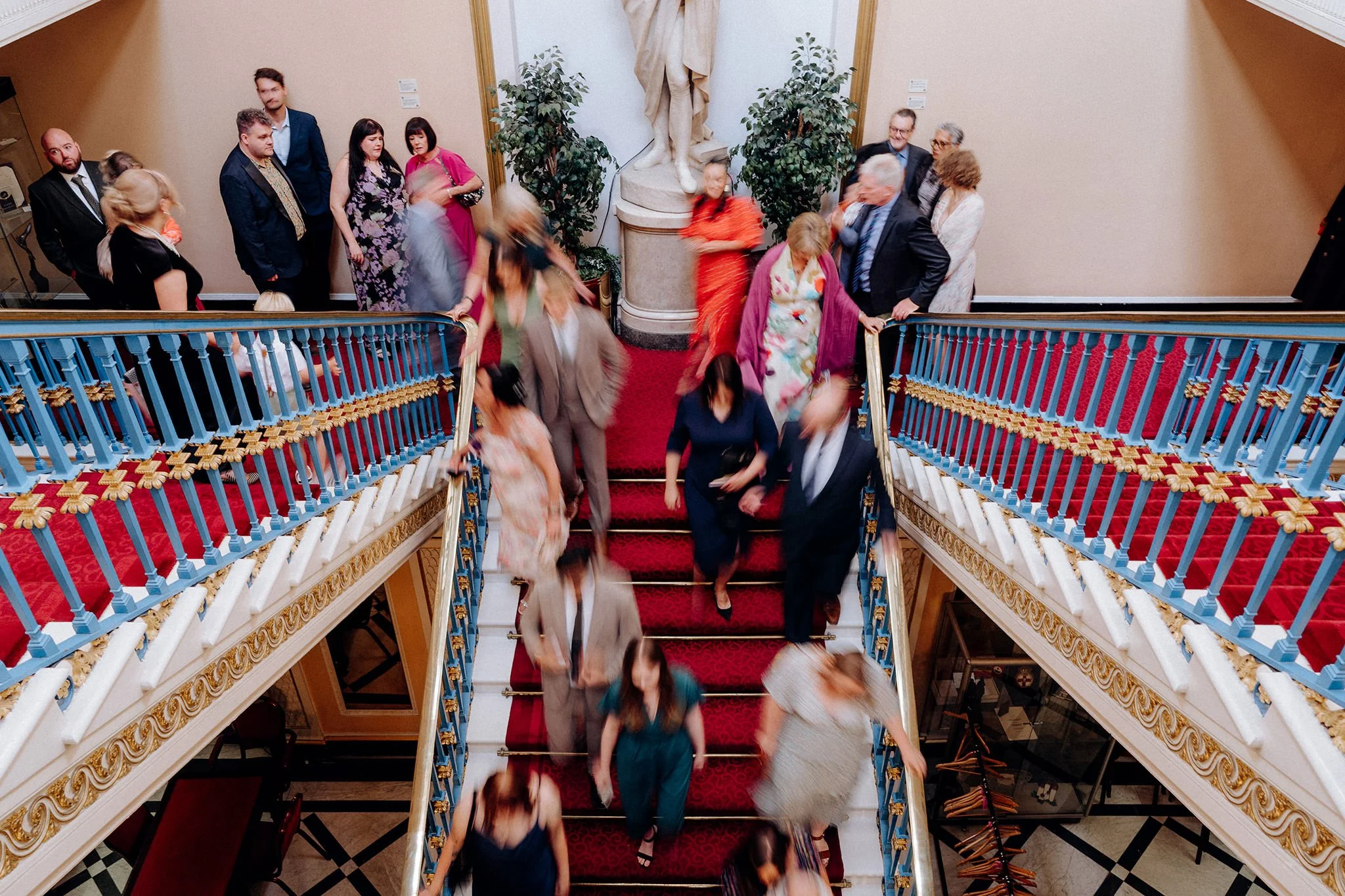 guests moving down steps at liverpool town hall