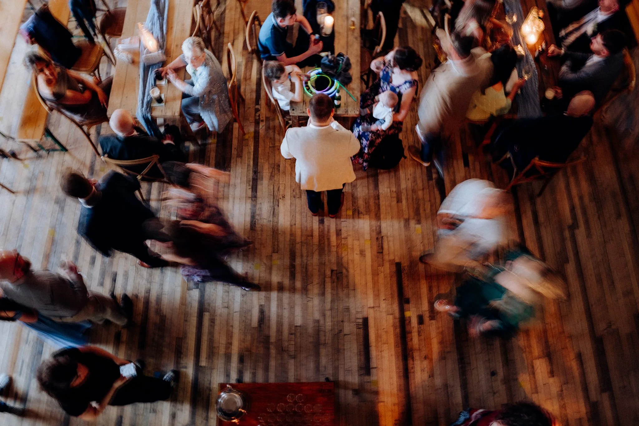wedding moment as guests move around at scale liverpool