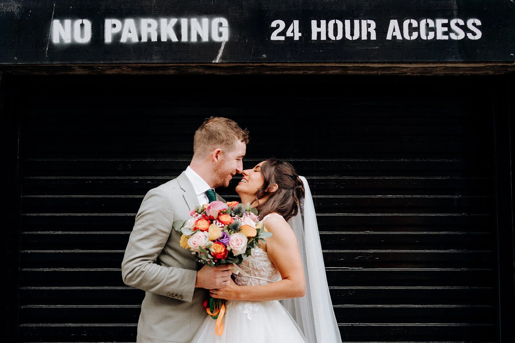 bride and groom quick portrait on the streets liverpool