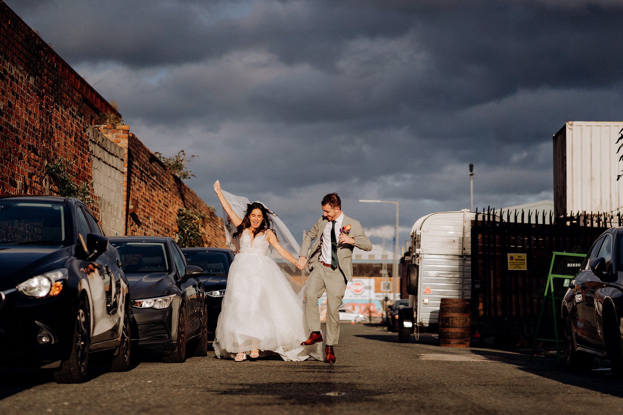 bride and groom take a walk in liverpool