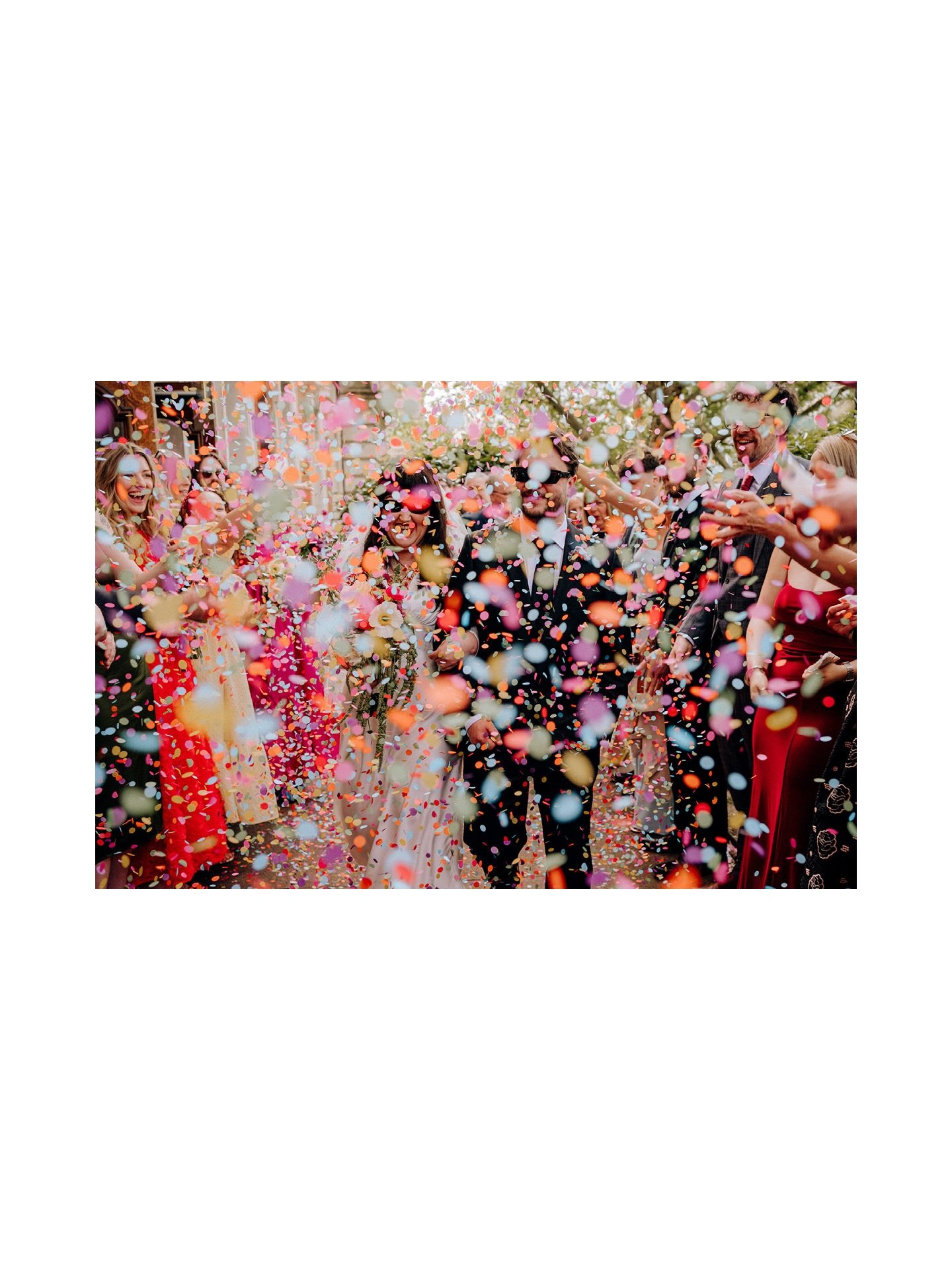 Congratulations Fiona and Geraint, it was loads of fun photographing your special day in Stockport on Saturday. Following their ceremony at Stockport Town Hall, and plenty of colourful confetti afterwards, they had a stroll through town together, gra