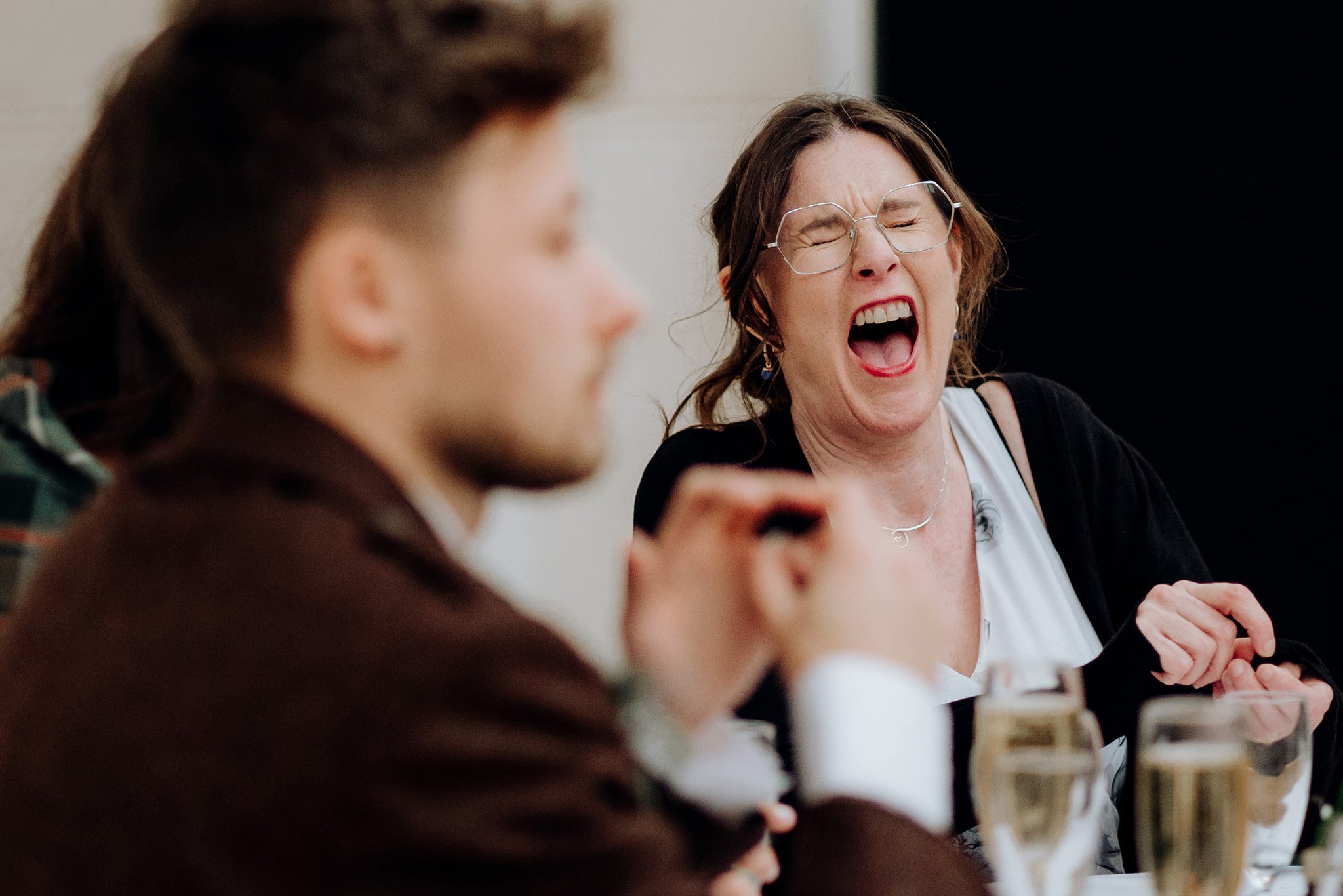 Mother of the bride laughing