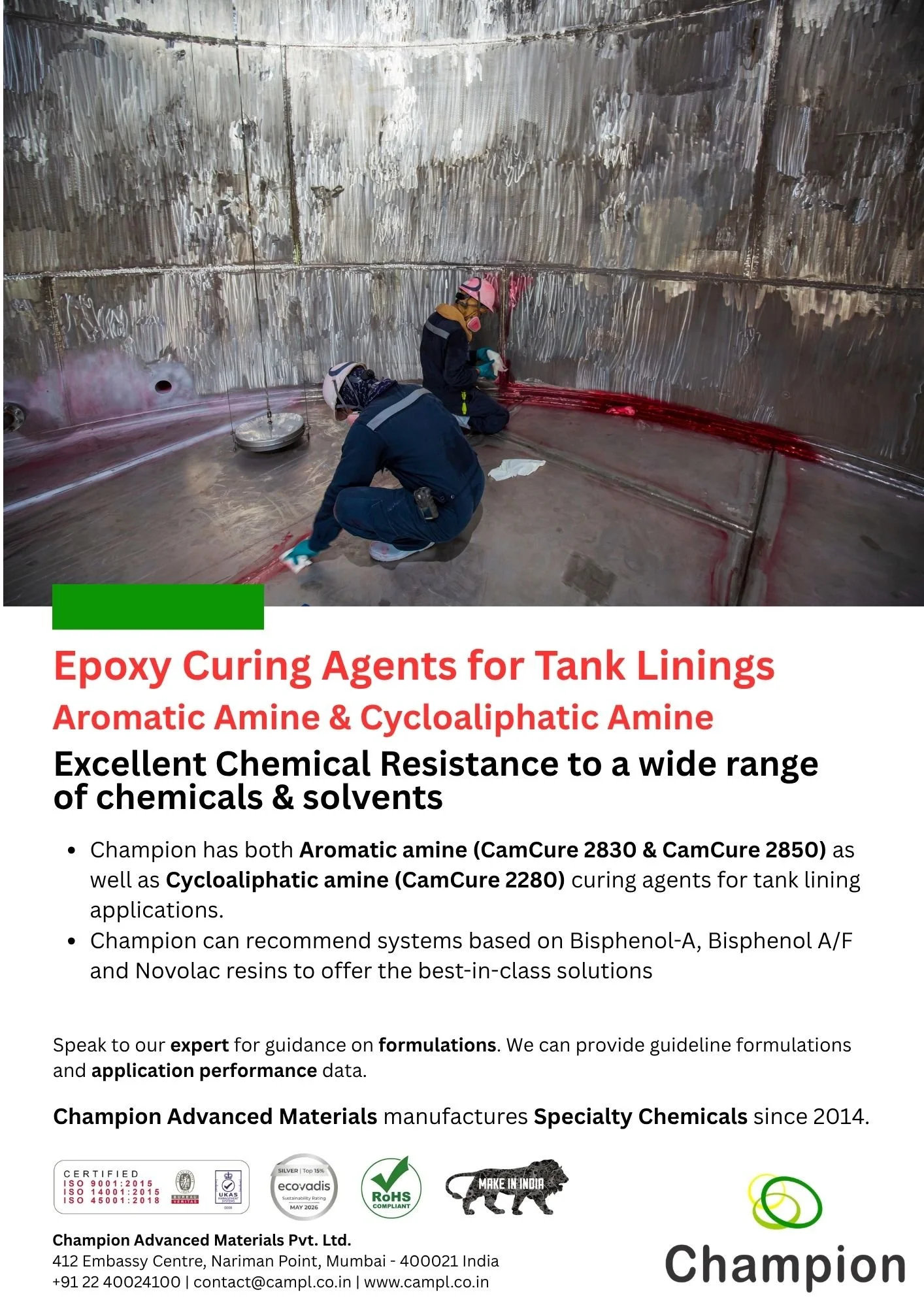 Two workers in protective gear applying a red lining to the interior of a large industrial tank for corrosion protection.