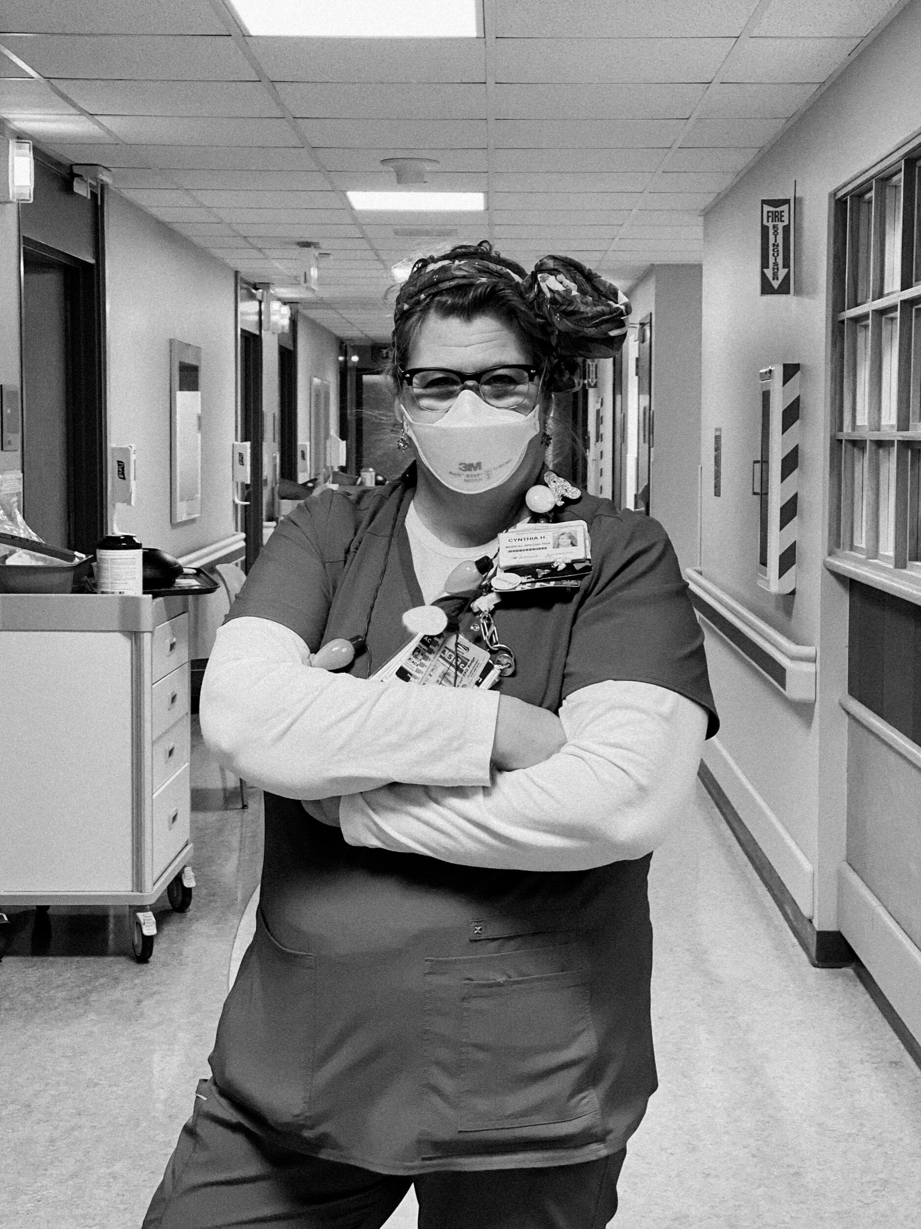 Portrait of Progressive Care COVID RN Cindy, on Christmas. December 2020. Photo by K.Palmisano.