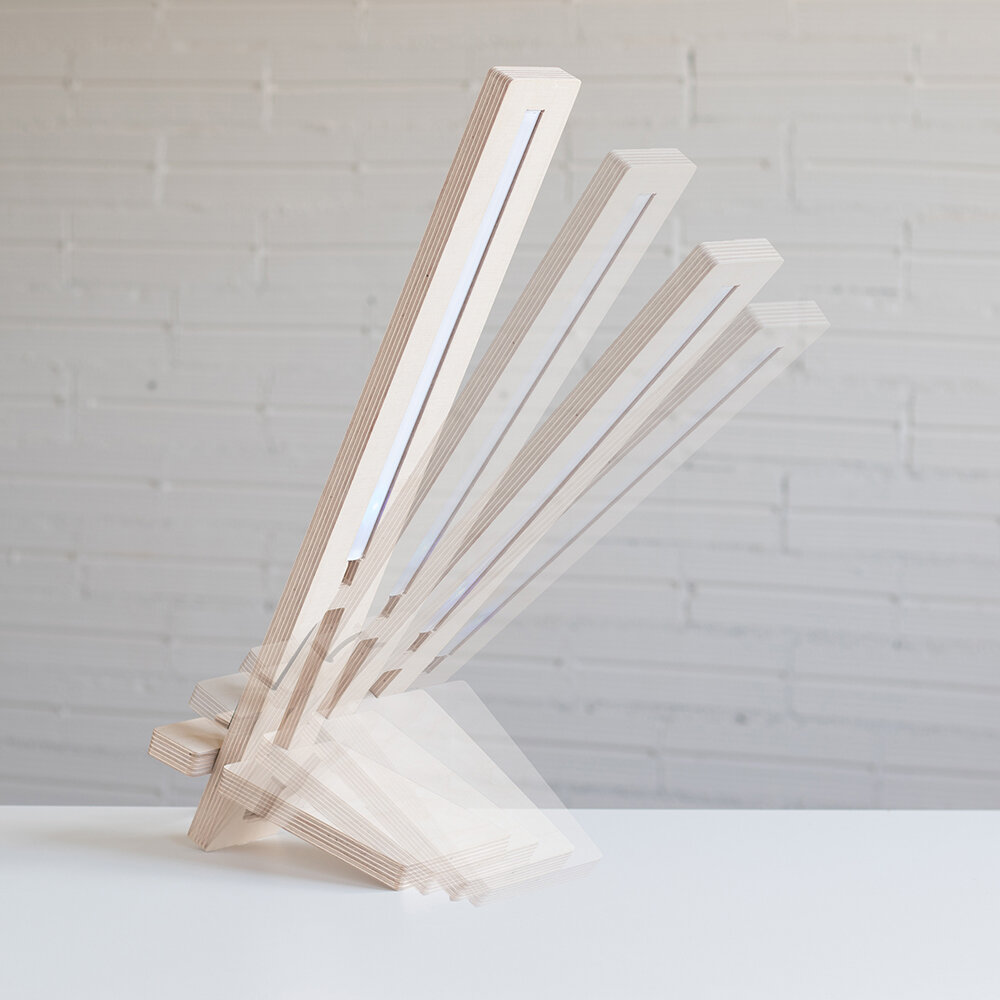 DELAMP: Dimmable LED table lamp with integrated motion sensor.