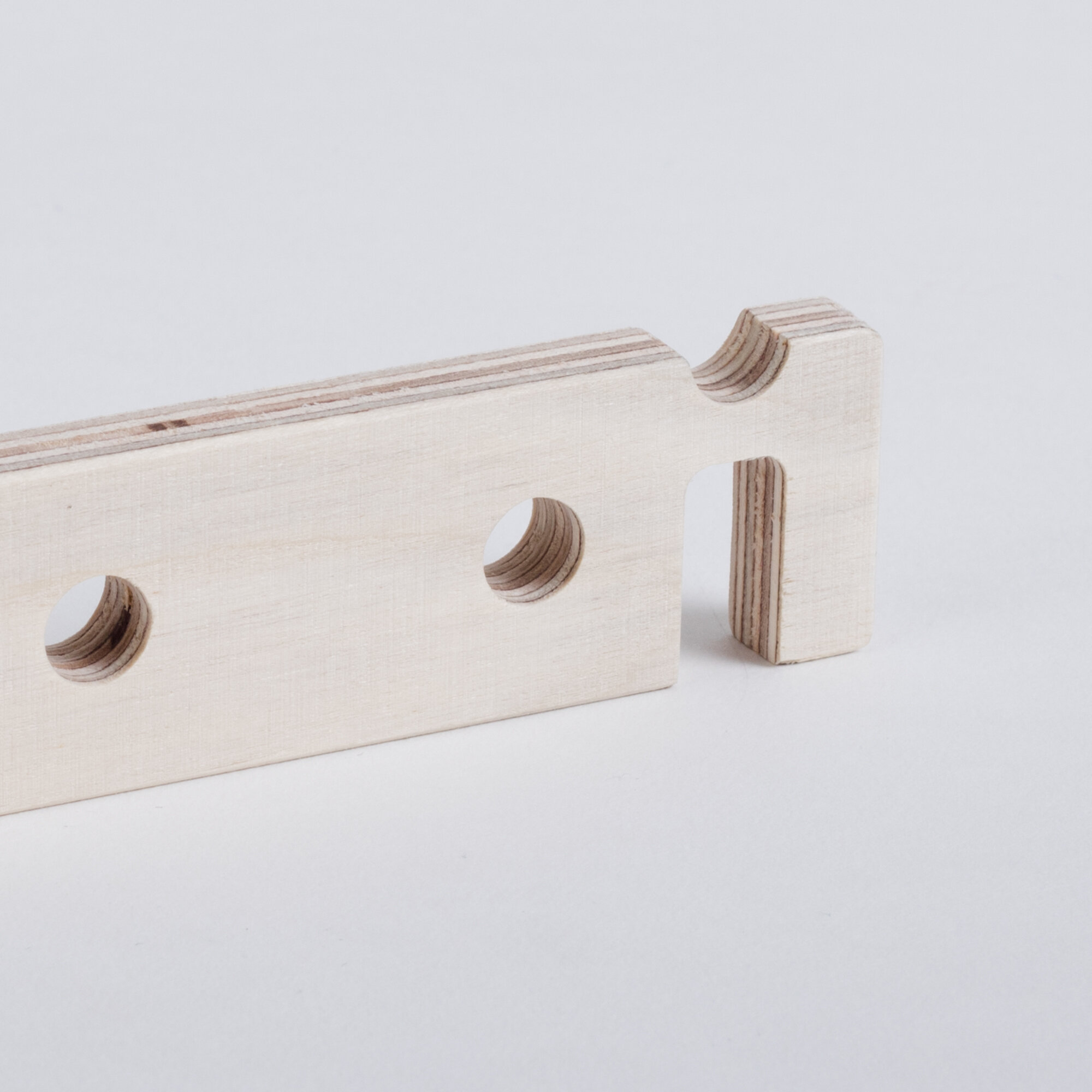 DEHOOK: Adjustable tilt mobile phone holder and headphone organizer.