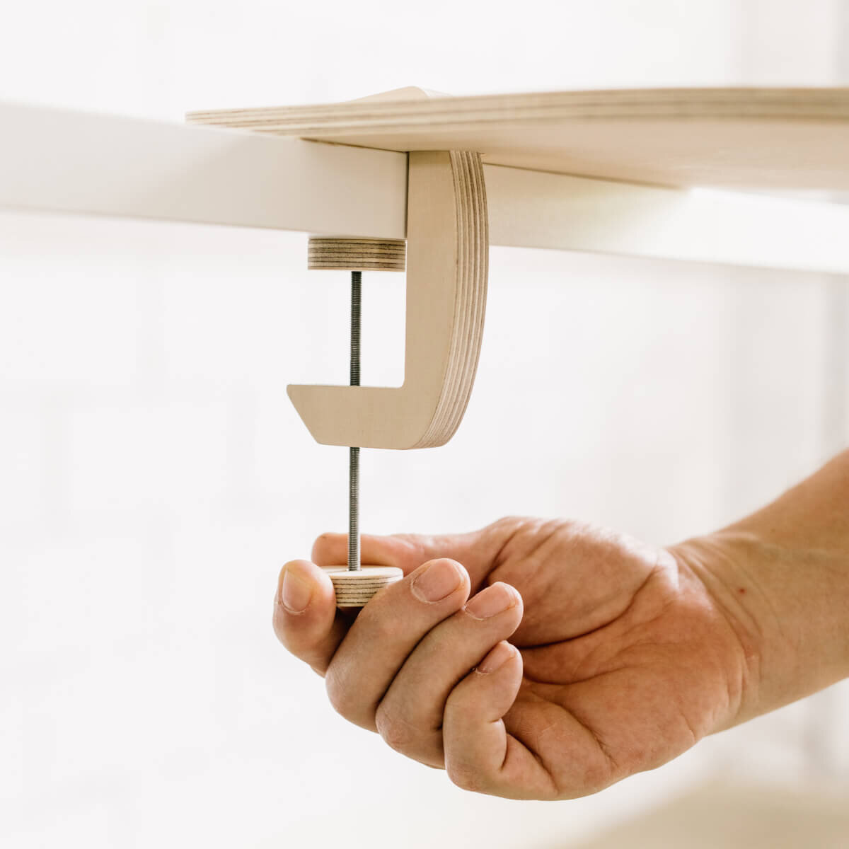 La Gota: Suport versàtil per a braç i superfície addicional ergonòmica.